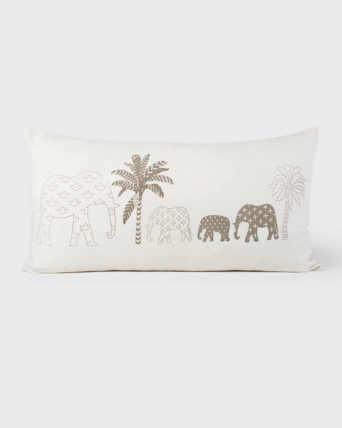 Ele Palm lumbar cushion cover with elephants and a palm tree.