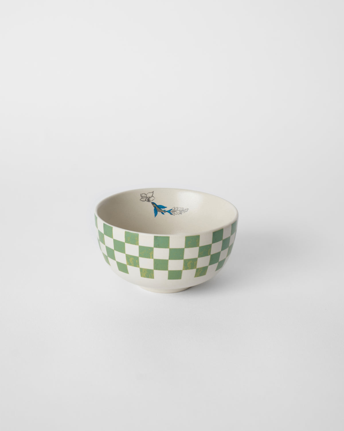 Green and ivory checked Reesha katori with a small blue bird motif inside.