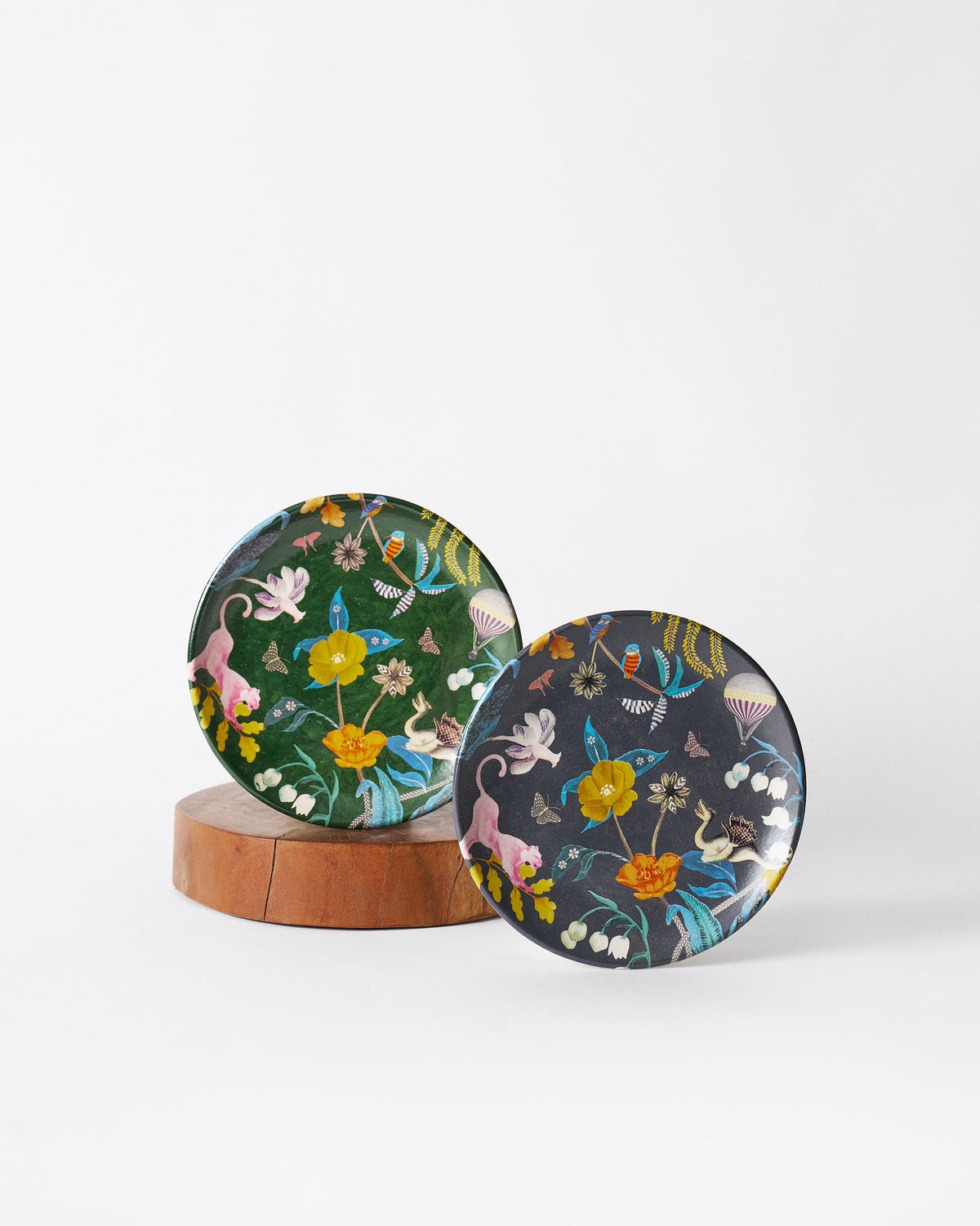 Pair of Myra quarter plates in emerald and charcoal with matching botanical wildlife print.