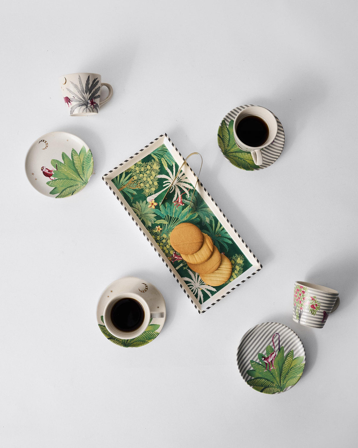 Overhead view of the Ceylon Trail Set with cups, saucers and a cookie tray.