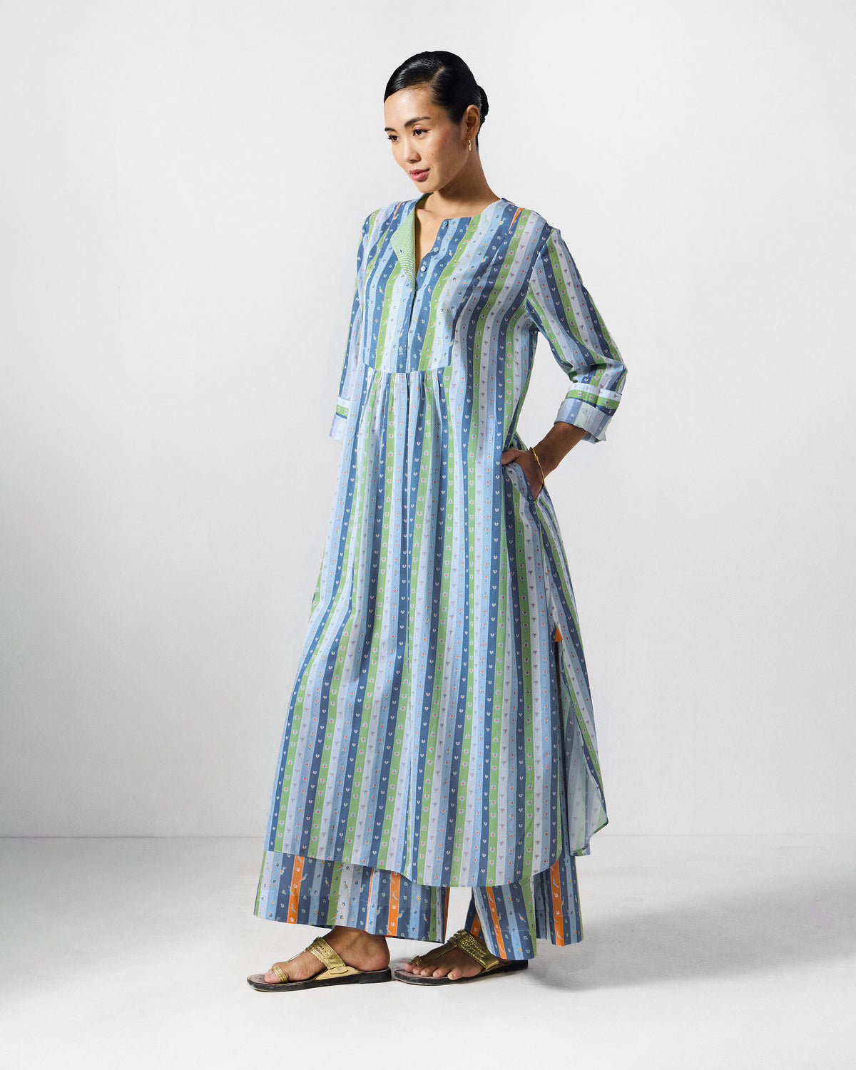 Side view of the Imke kurta set showing its striped A-line silhouette.