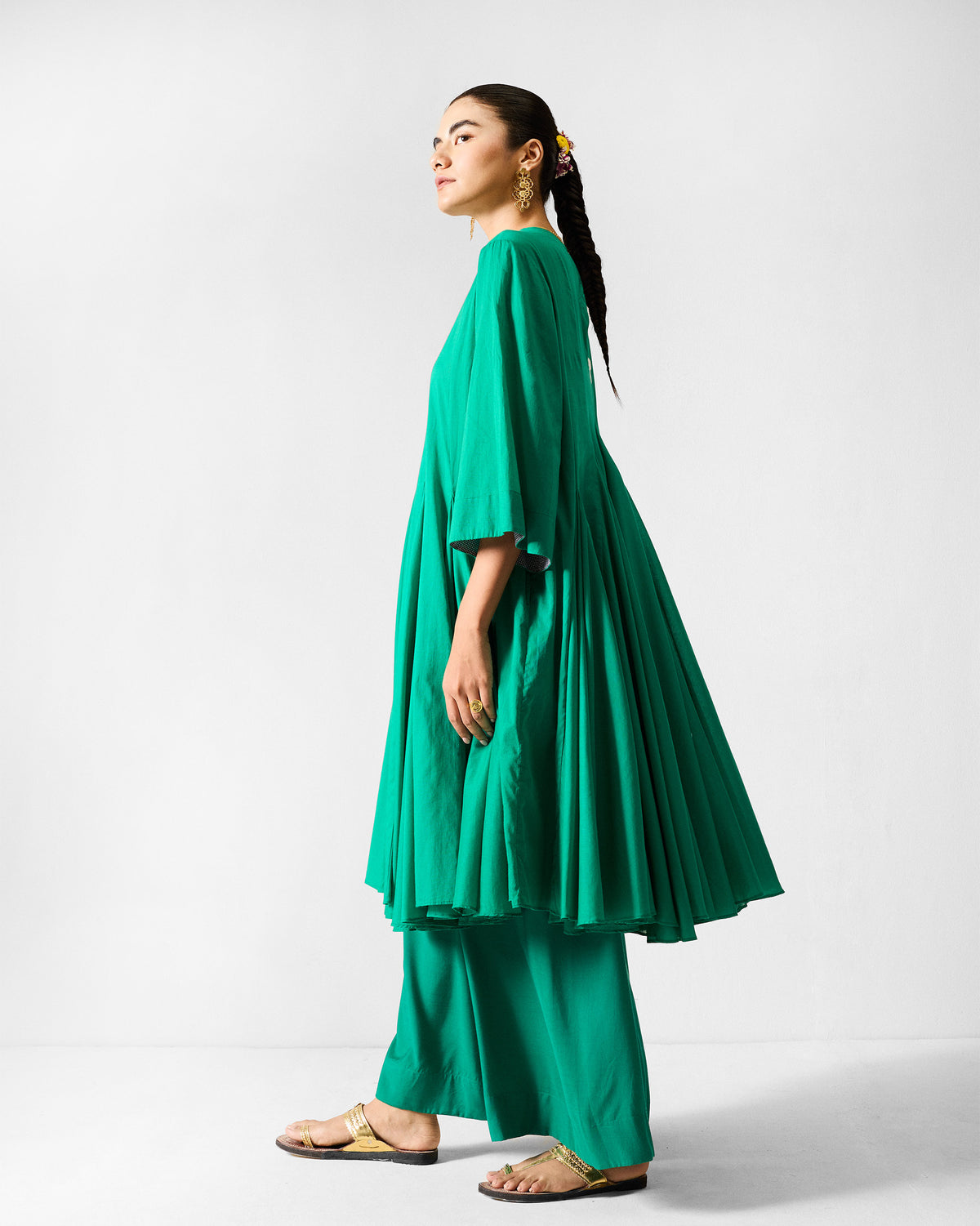 Side view of the Gusset long kurta set showing its flared silhouette.