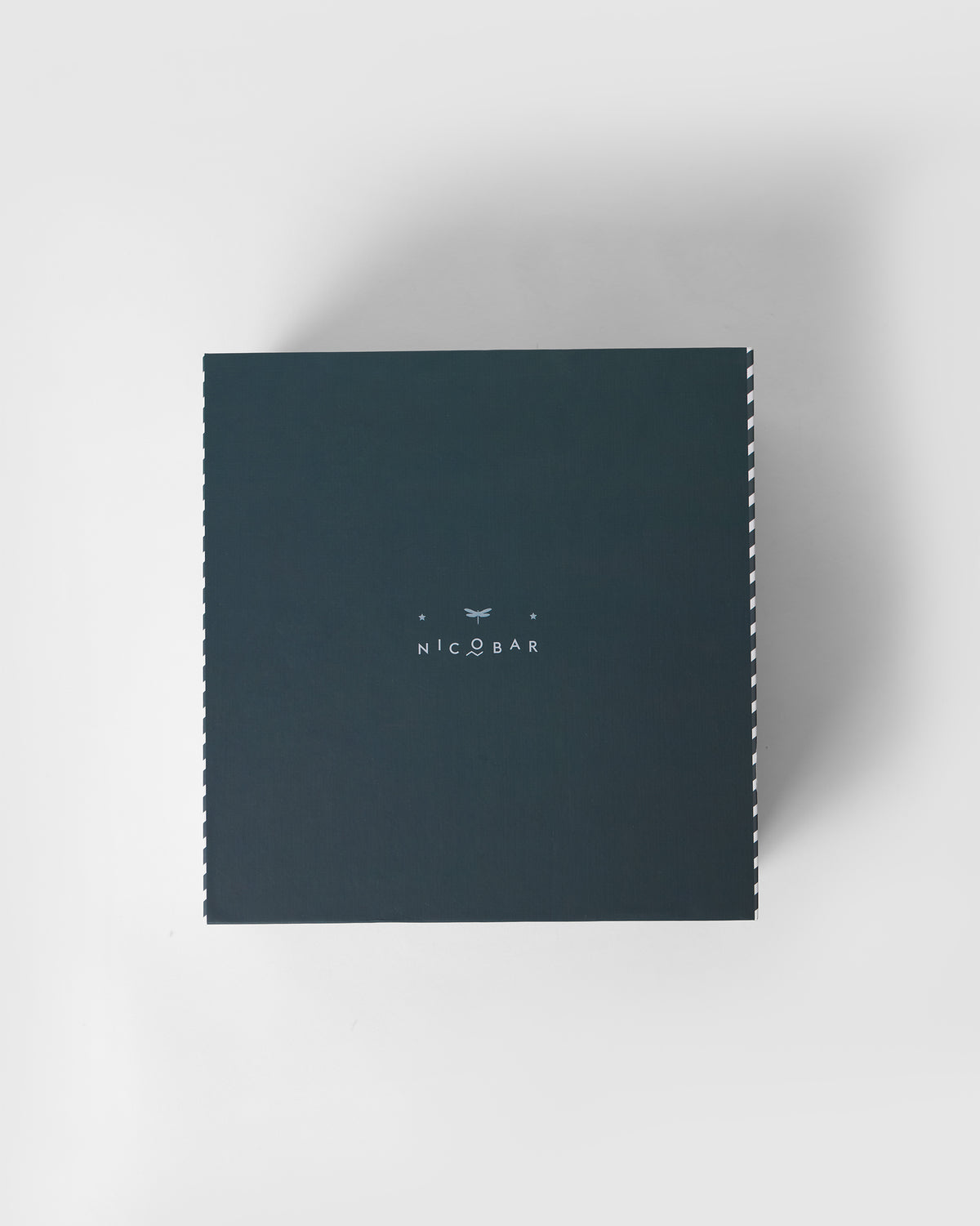 Navy Tarang Bar Gift Set box with a small Nicobar logo, seen from above.