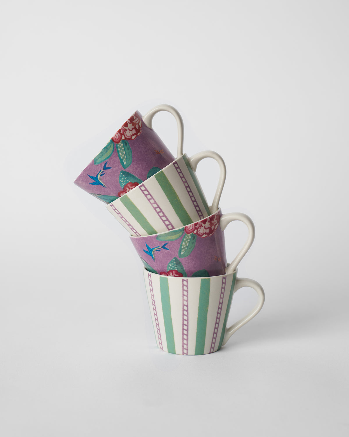Stack of four Buransh Espresso Mugs alternating blooms and stripes.