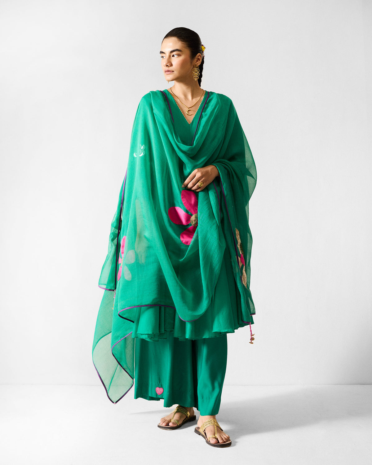 Person wearing the Gusset long kurta set with a sheer dupatta draped over the shoulders.