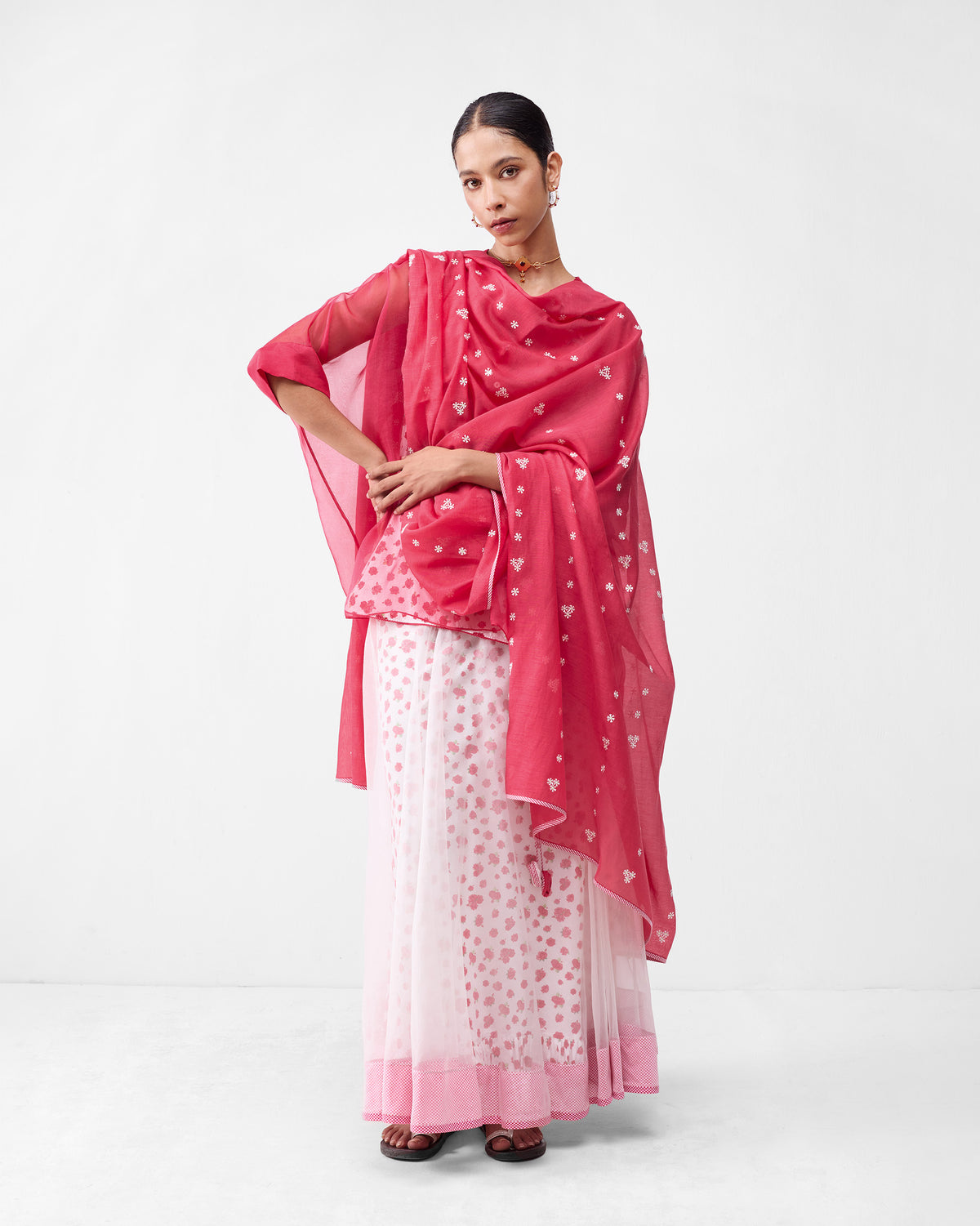 Desert Bloom set with a sheer fuchsia overlay and ivory floral skirt with a pink border.