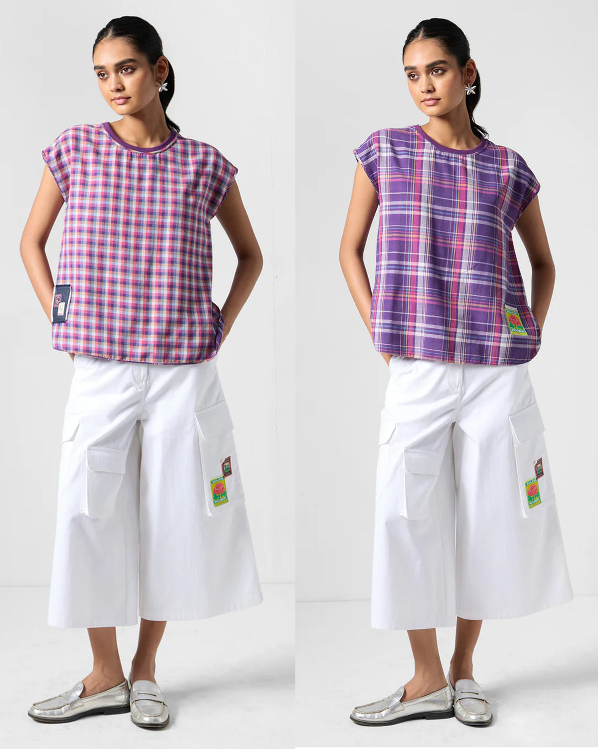 Both sides of a purple check Flow reversible top shown side by side.