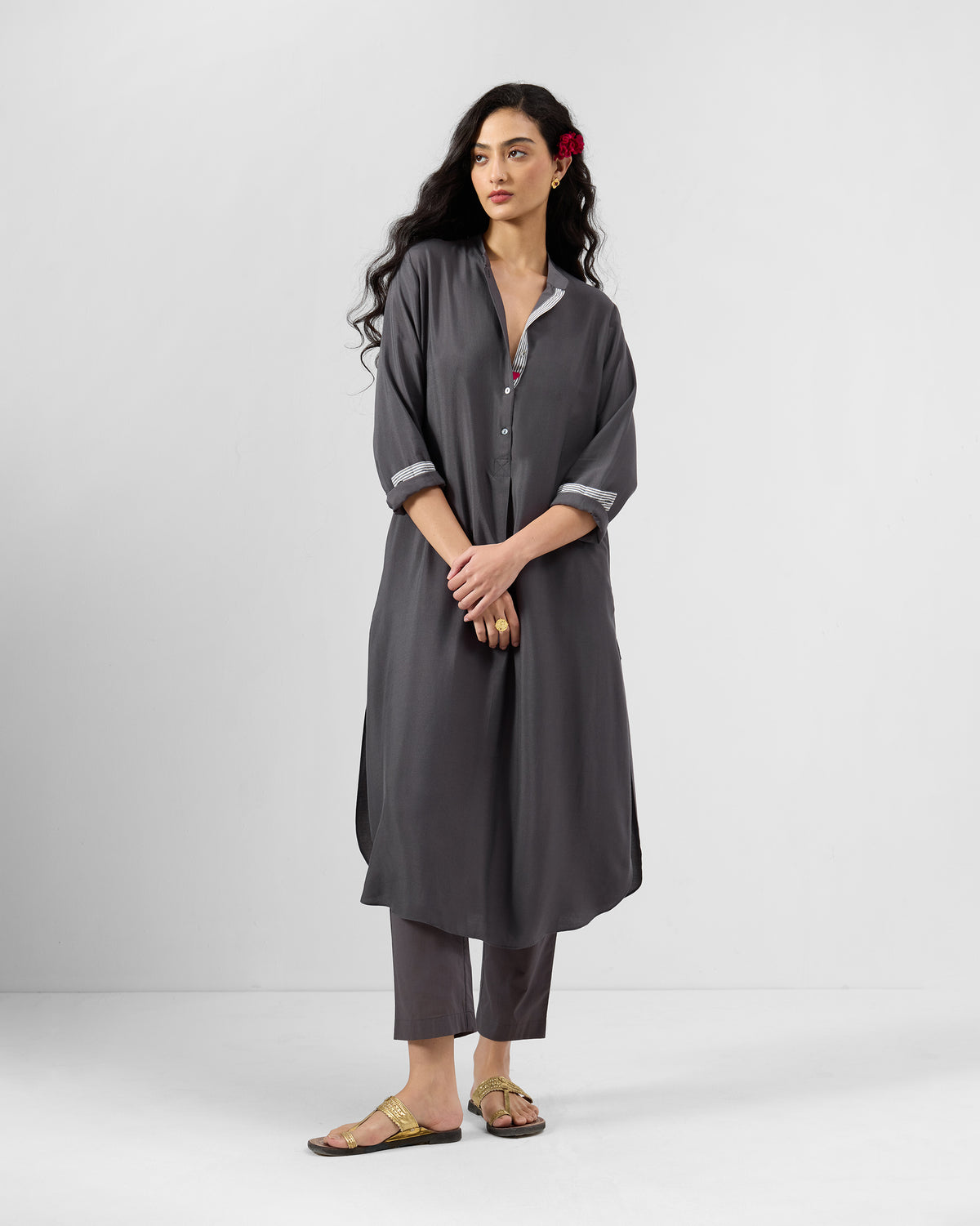 Person wearing a charcoal Basic Long Length Kurta Set with matching trousers.