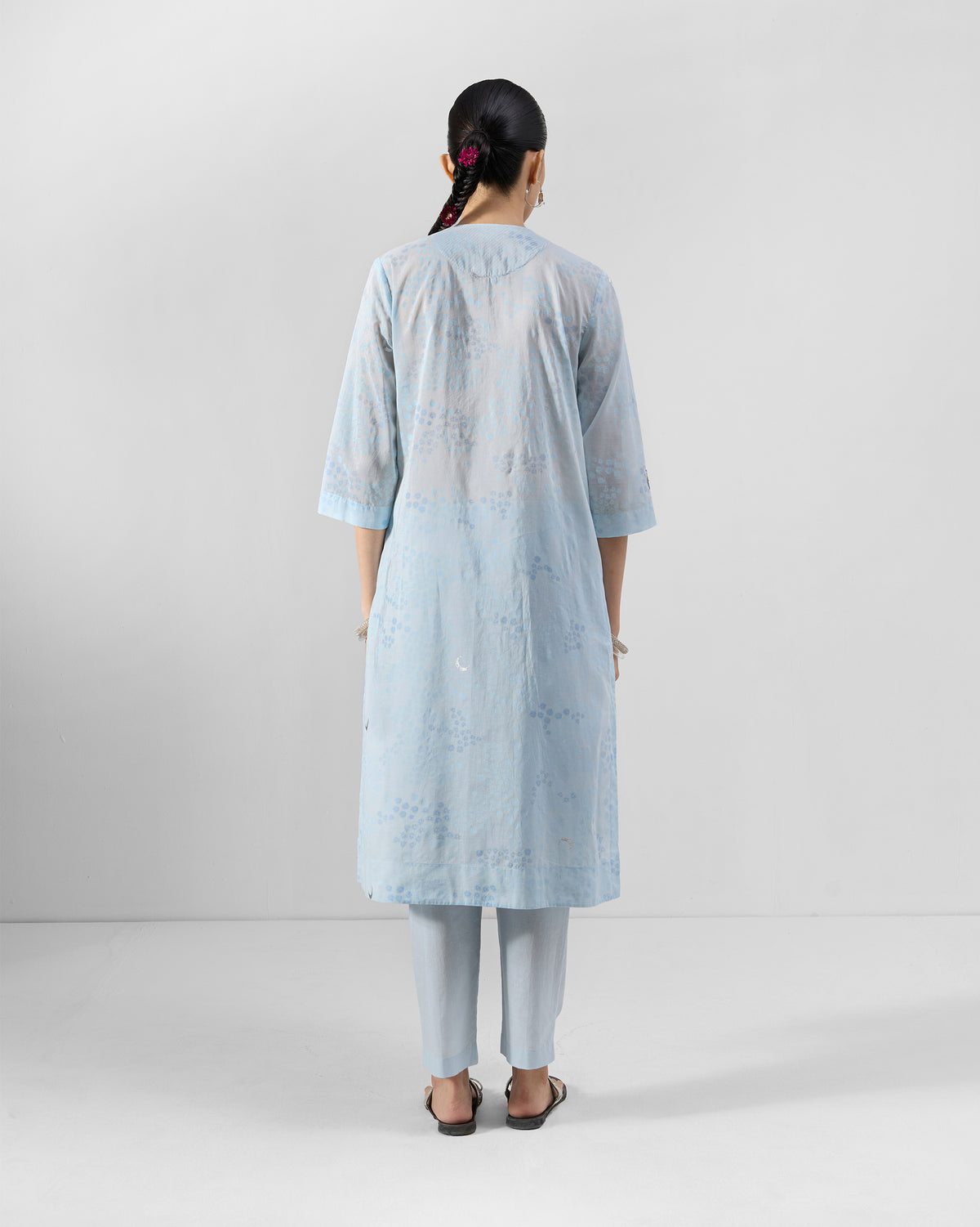 Back of a pale blue Kolva Kurta Set with tonal floral embroidery.