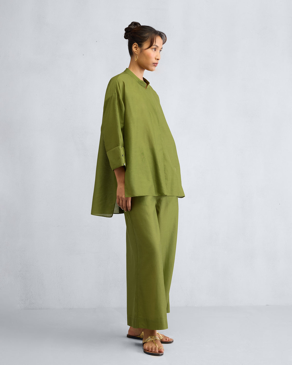 Side view of the Cirrus Shirt Set worn by a person.