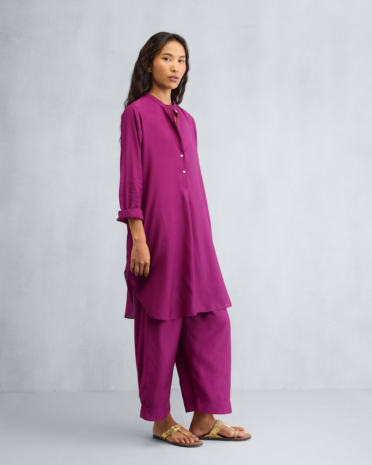 Side view of a mulberry mid-length kurta set showing the side slits.