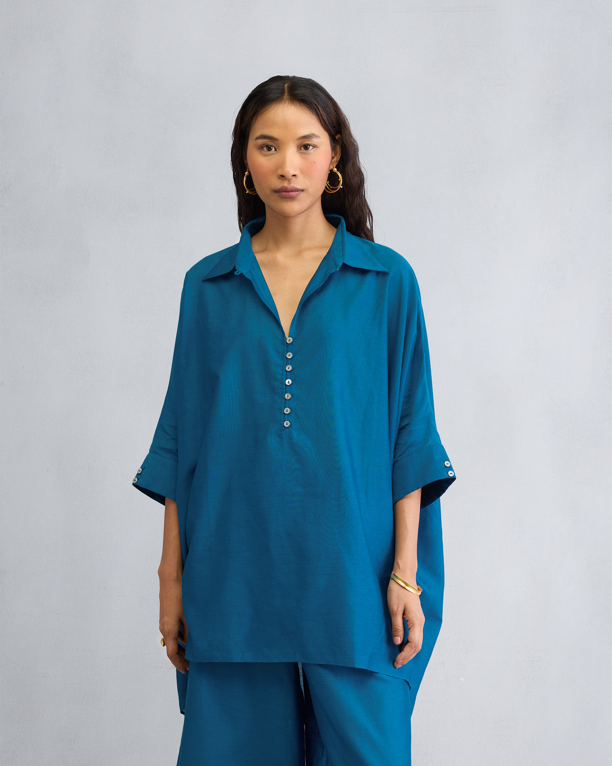 Upper-body front of the Hala Tunic Set worn by a person.