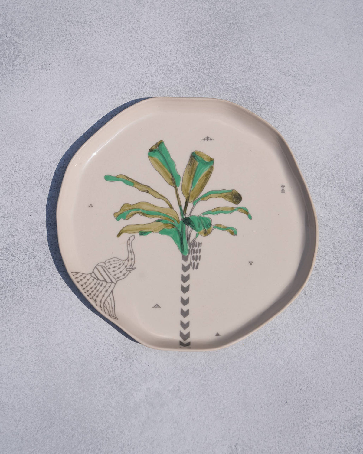 Ceylon Palm Quarter Plate with a palm tree and elephant motif.