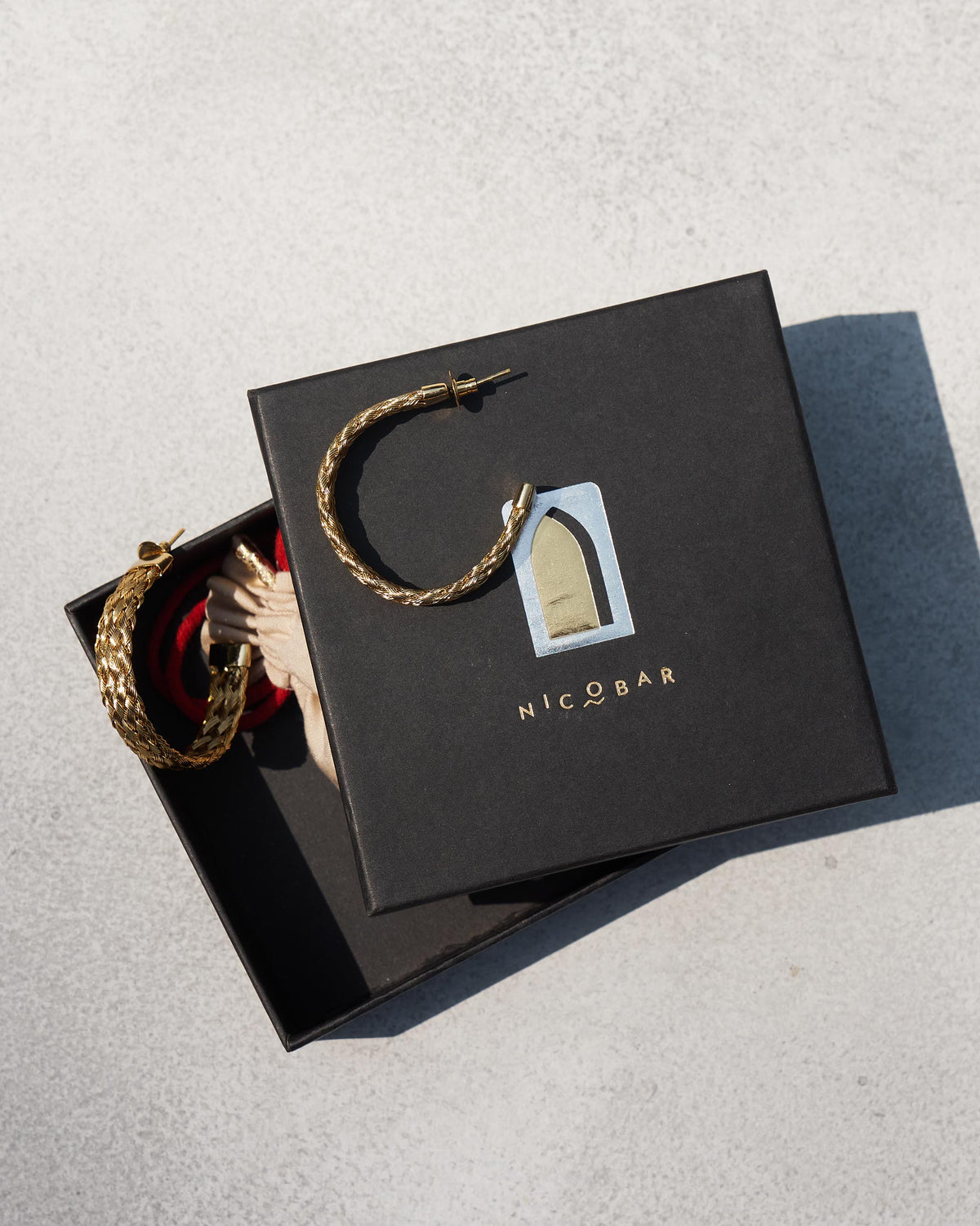 Gold Sea Shore Hoops in a Nicobar gift box.