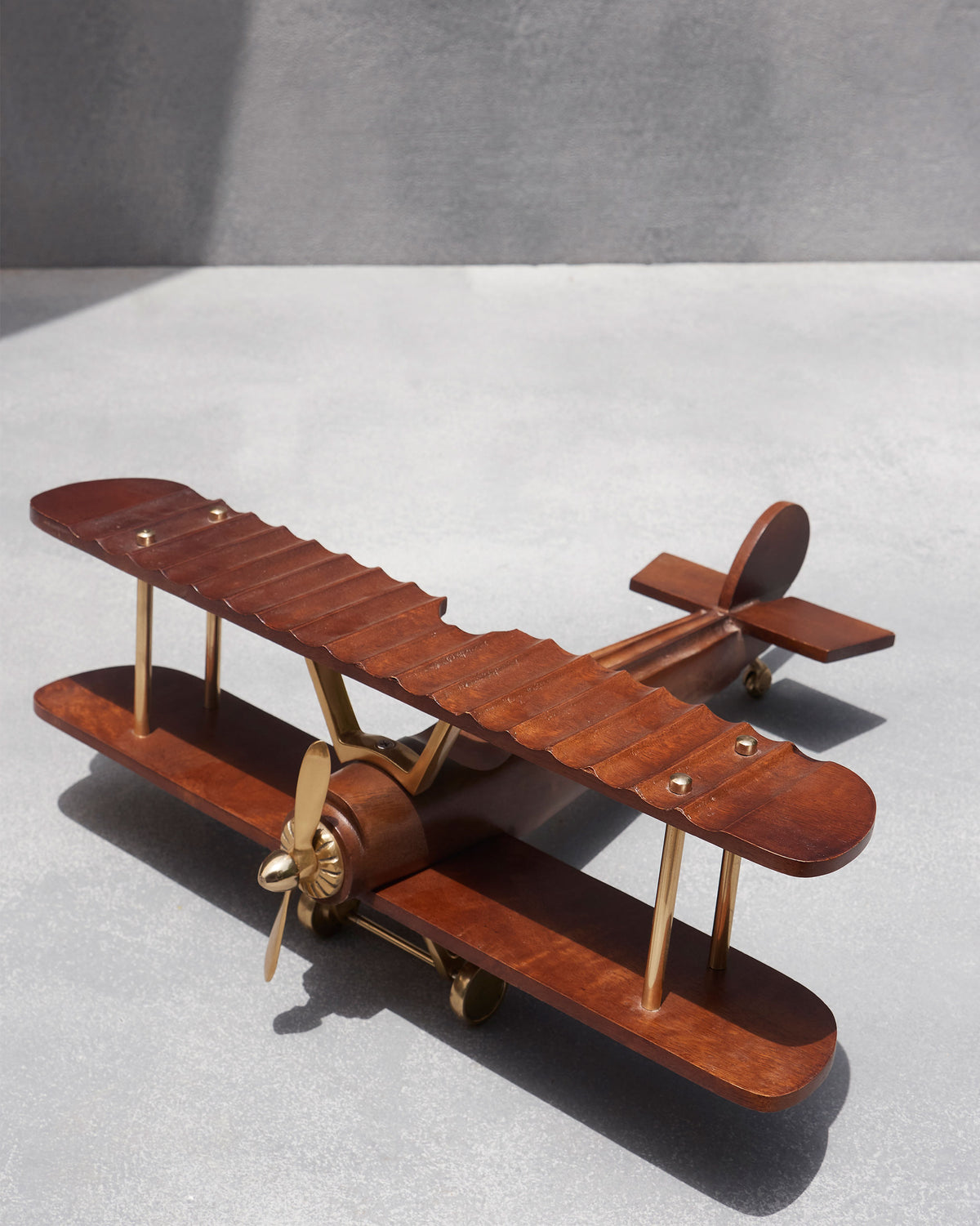Wood and brass Beufort biplane from above showing wing struts.