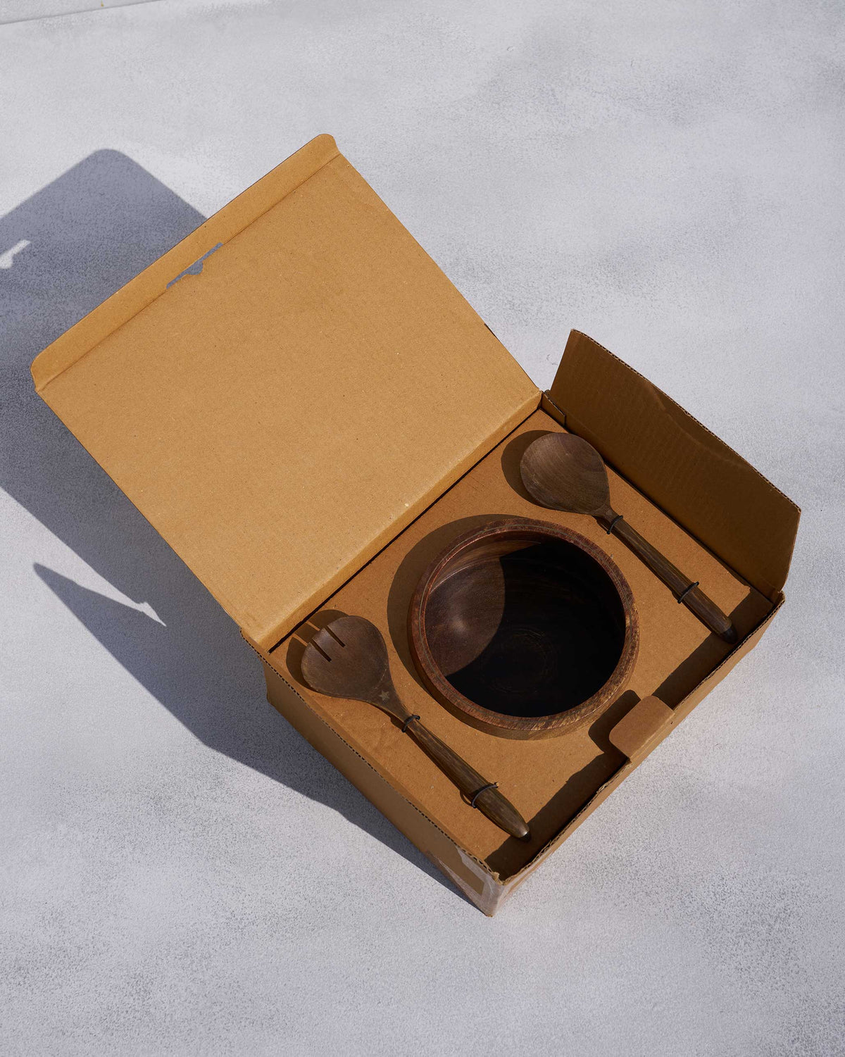 Bara salad bowl set packed in an open cardboard gift box.