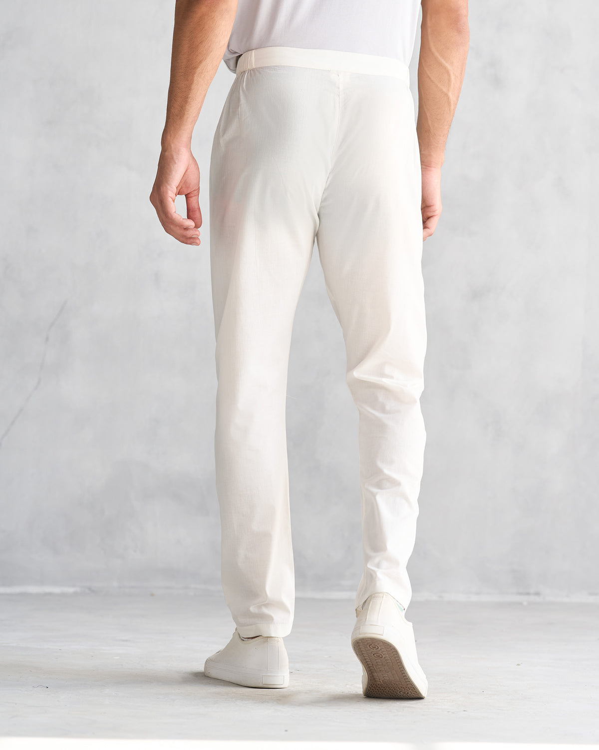 Back of ivory Kurta Pants worn by a person.