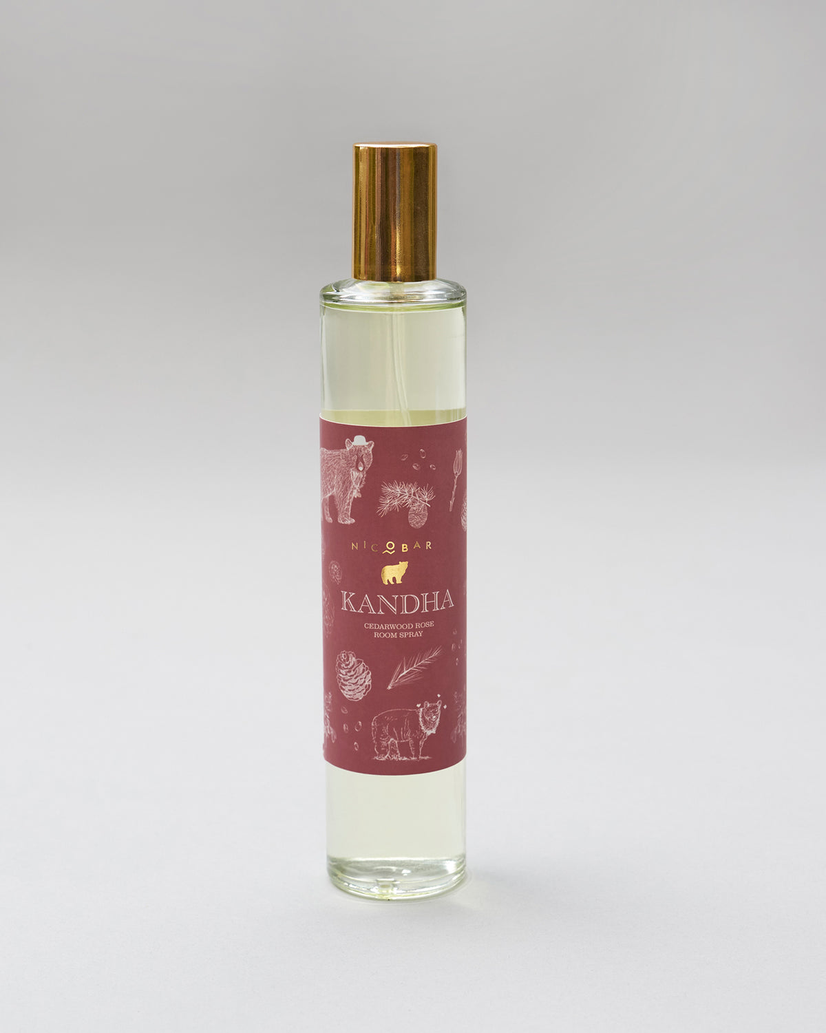 Kandha cedarwood room spray bottle with maroon forest label.