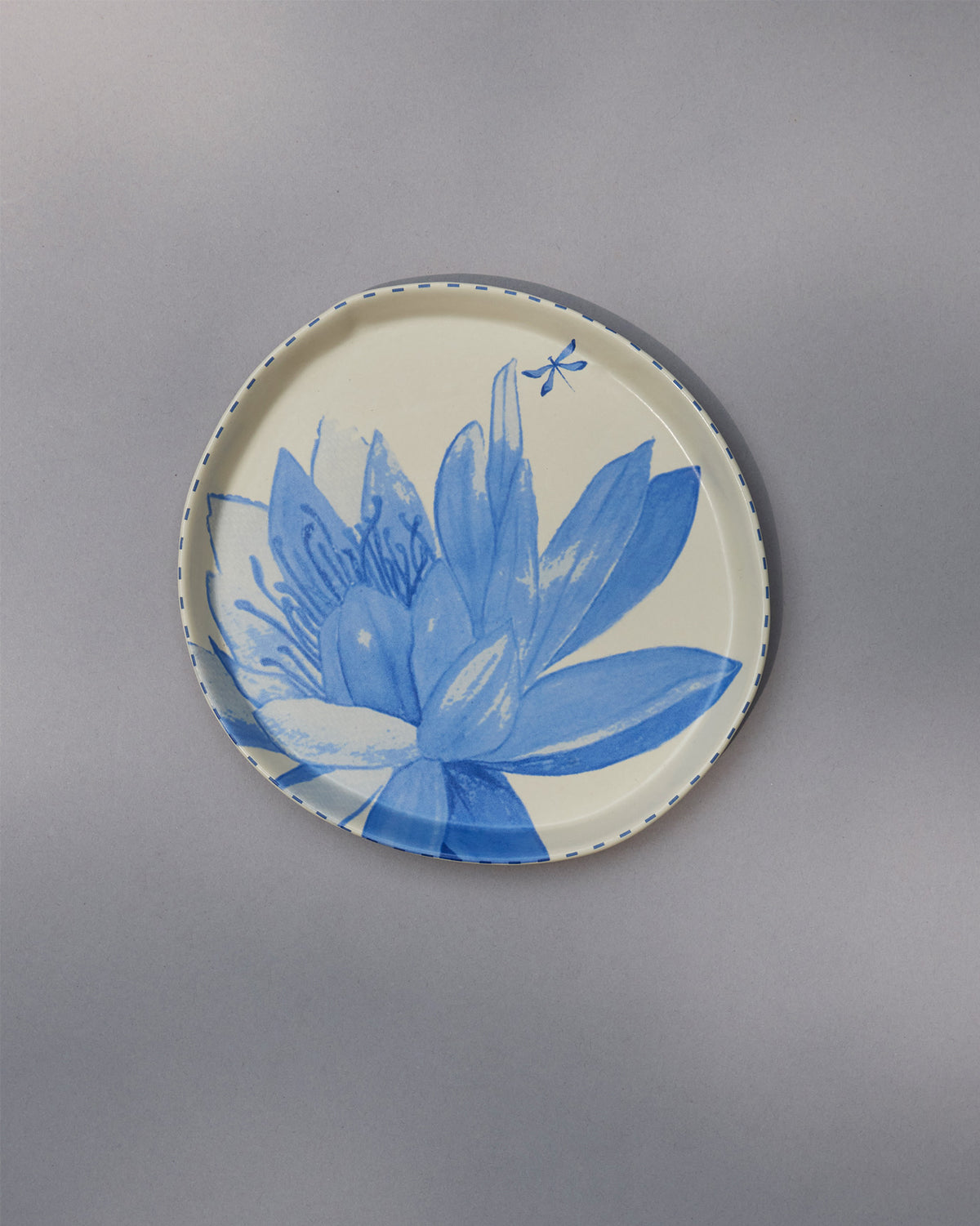 Seroja Dessert Plate with a blue lotus flower and dragonfly.