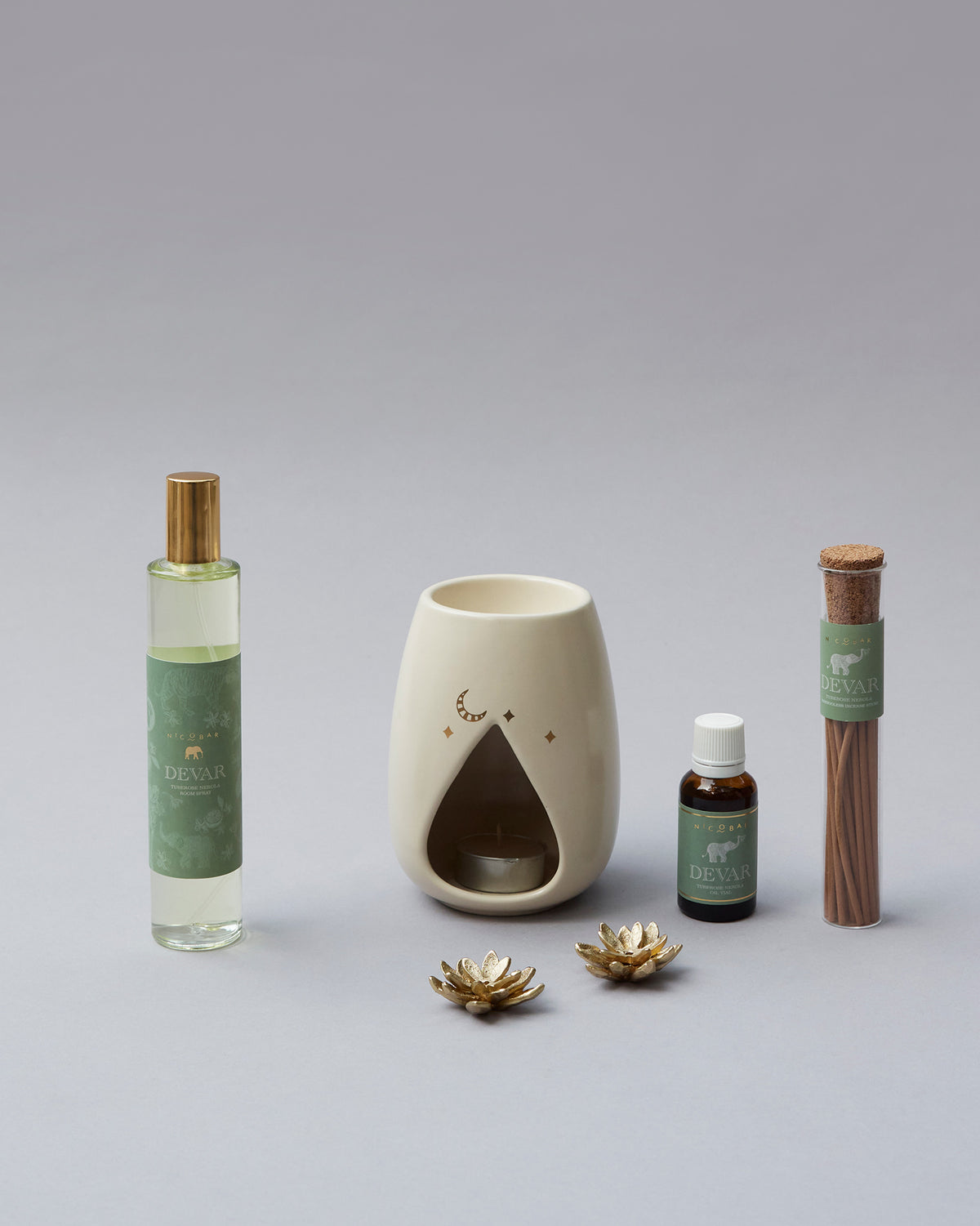 Woodland Gift Set oil burner with a cut-out teardrop opening and crescent moon motif.