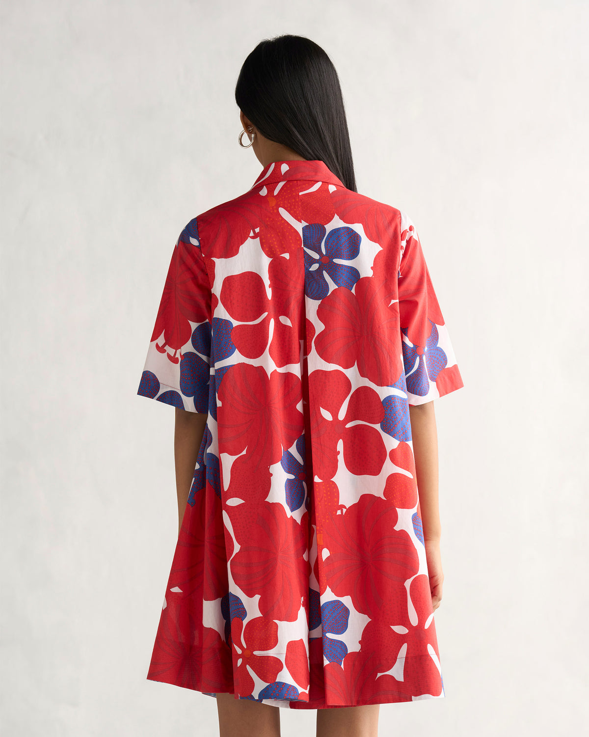Back of a multi-colour Happy Heart Dress showing a yoke and box pleat.