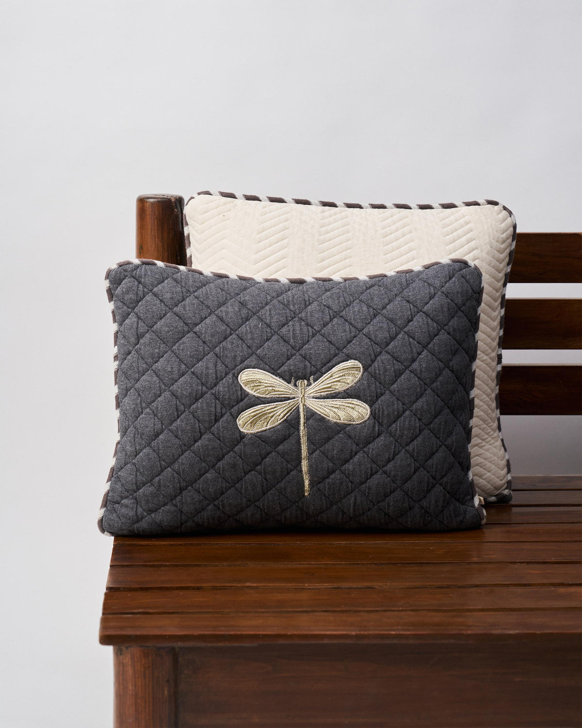 Quilted Dragonfly Cushion Cover in grey with an embroidered dragonfly.
