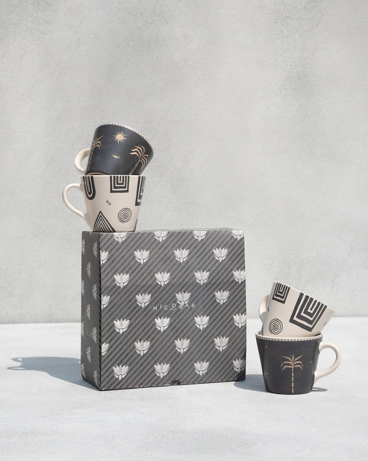 Serenity espresso mug set of four with a patterned Nicobar gift box.
