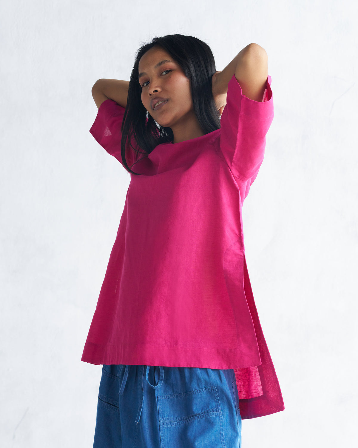 Berry High Slit Top showing high side slits and a longer back hem.