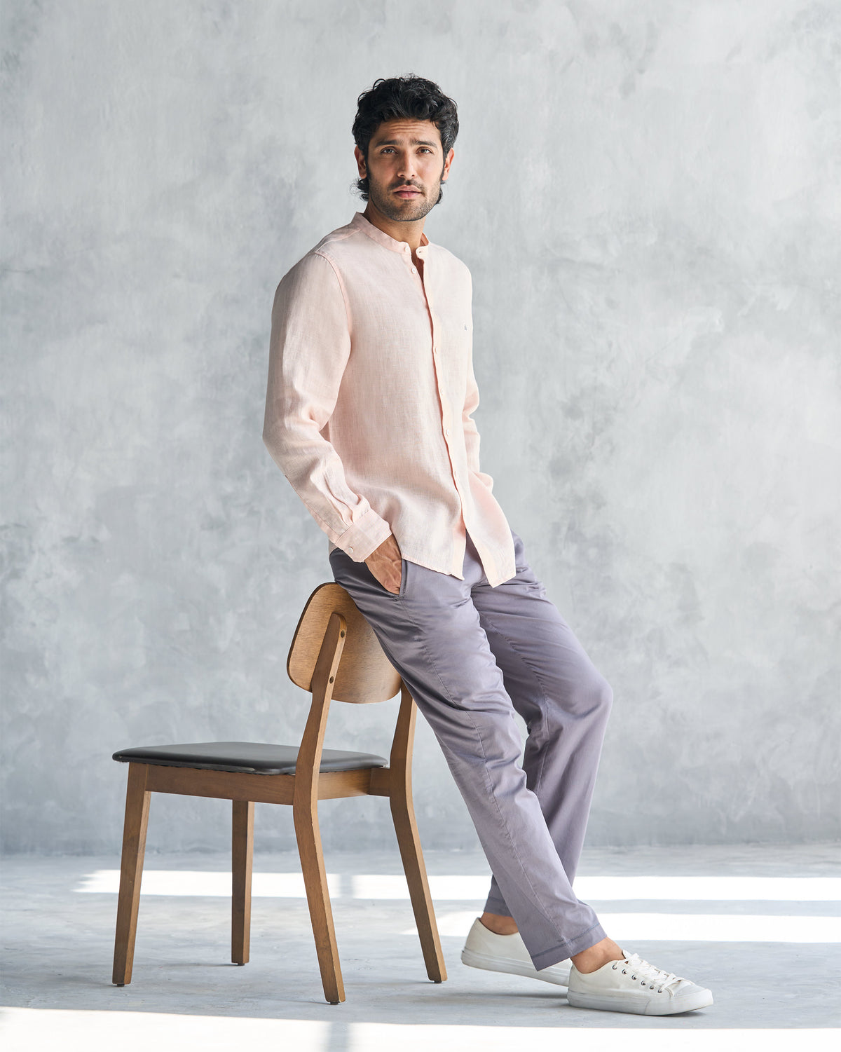 Person wearing charcoal Kurta Pants with a relaxed straight leg.