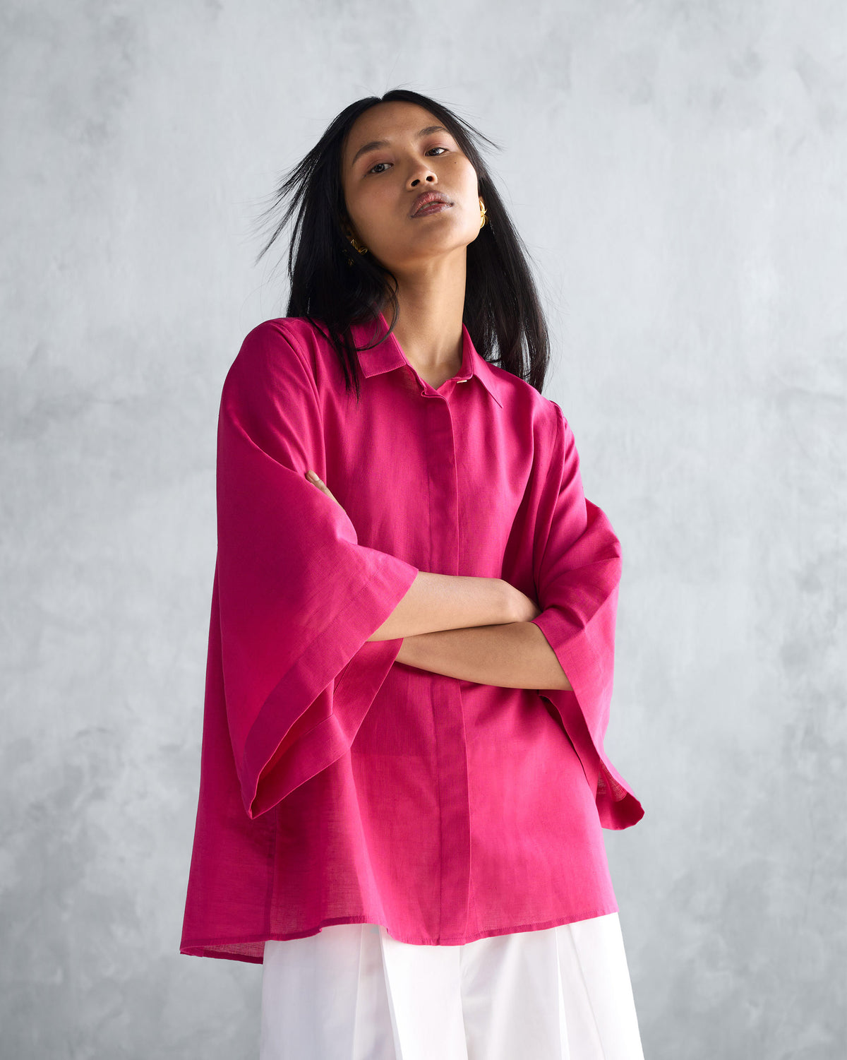 Person wearing a berry Drop Armhole Shirt with a boxy oversized fit.