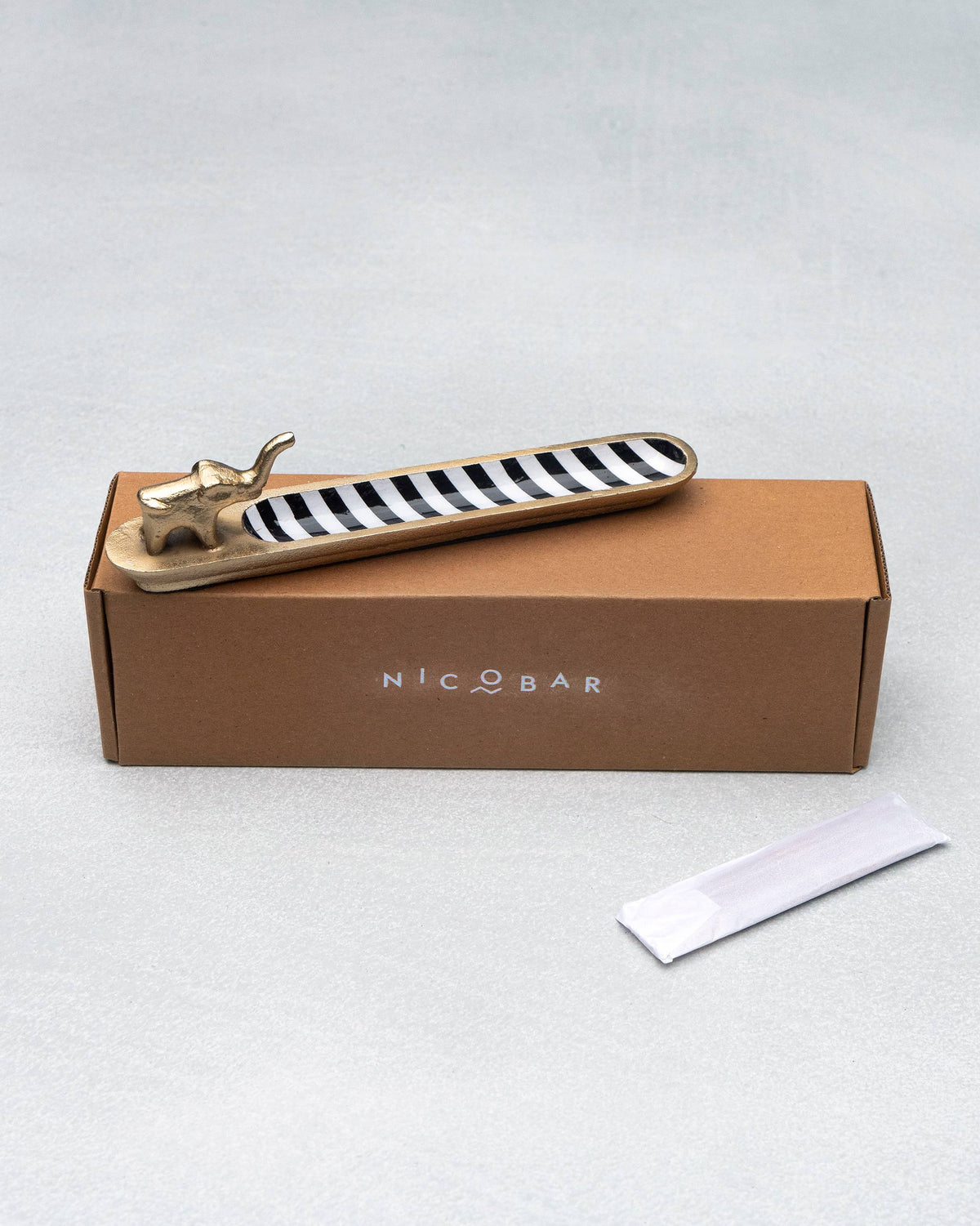Haathi incense holder with its Nicobar box and incense packet.