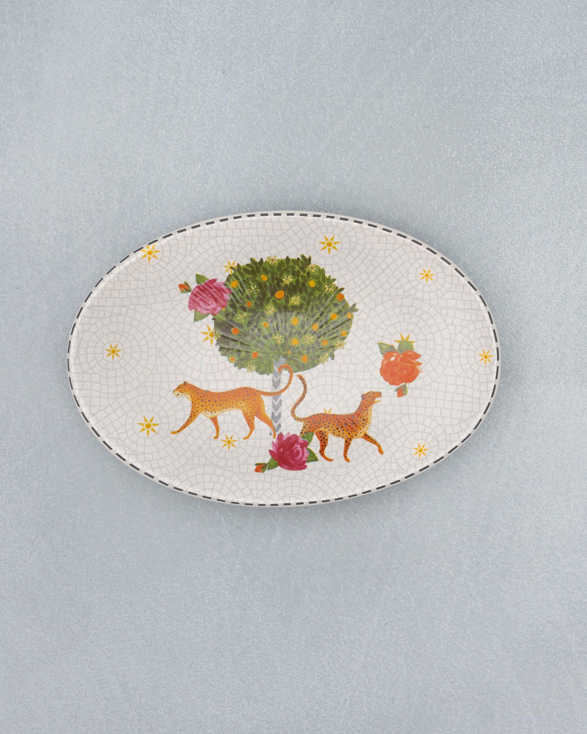Cream Mirage oval platter with twin leopards and rose motifs.