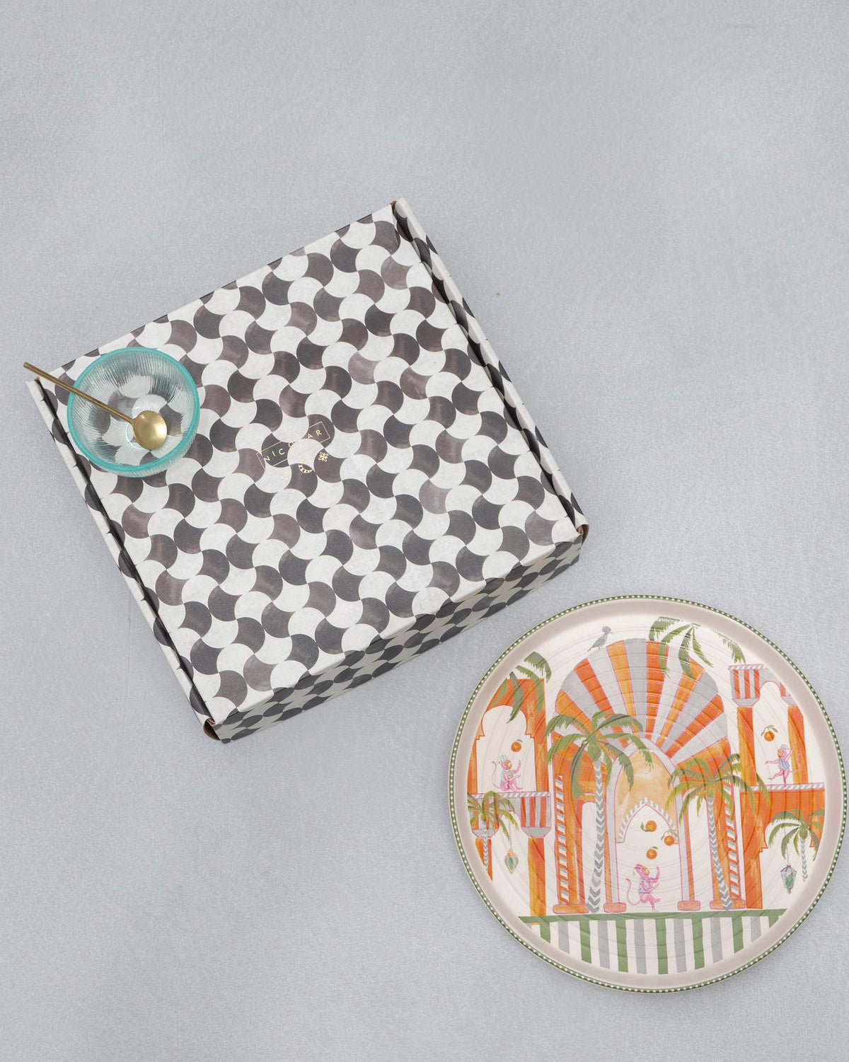 Mirage chip and dip platter with gift box, teal bowl, and gold spoon.