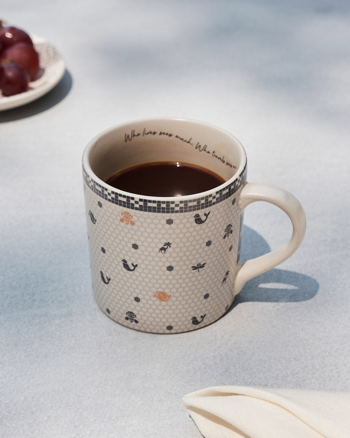 Sirocco straight mug filled with coffee.