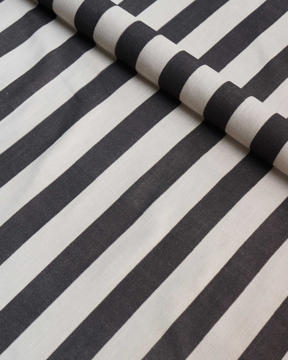 Close-up of Charcoal Stripe Fabric showing bold charcoal stripes.