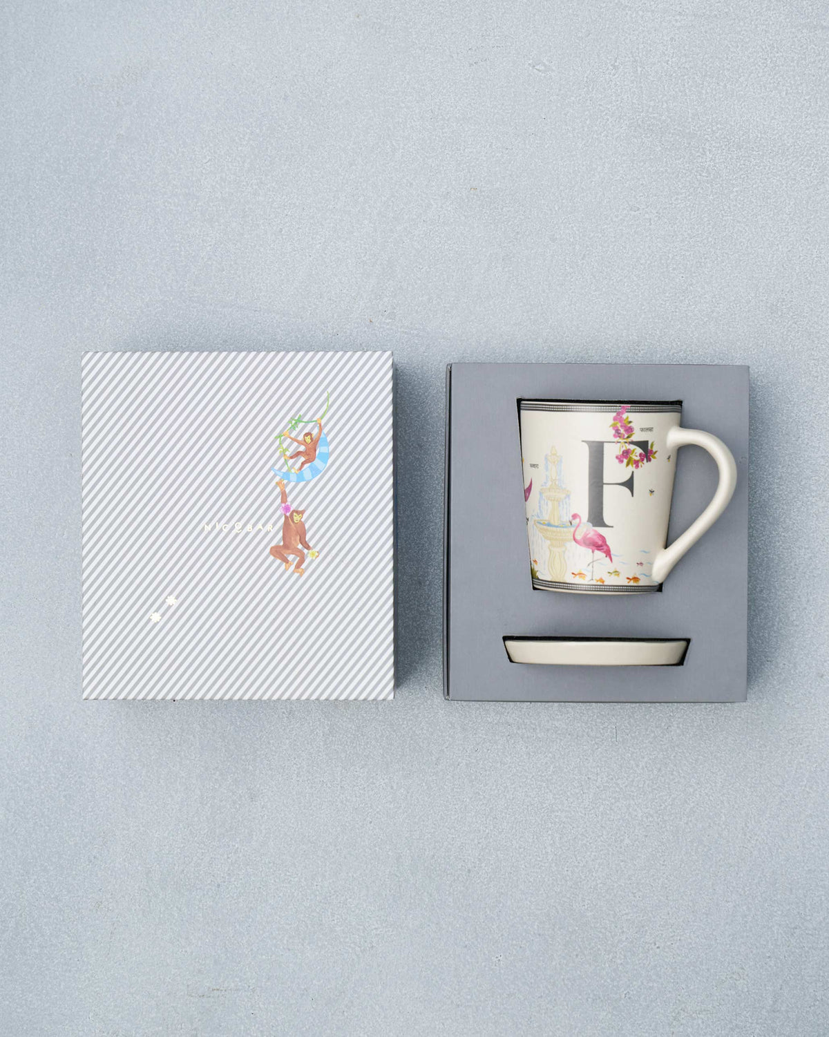 F Alphabet set packed in its gift box with mug, saucer and striped lid.