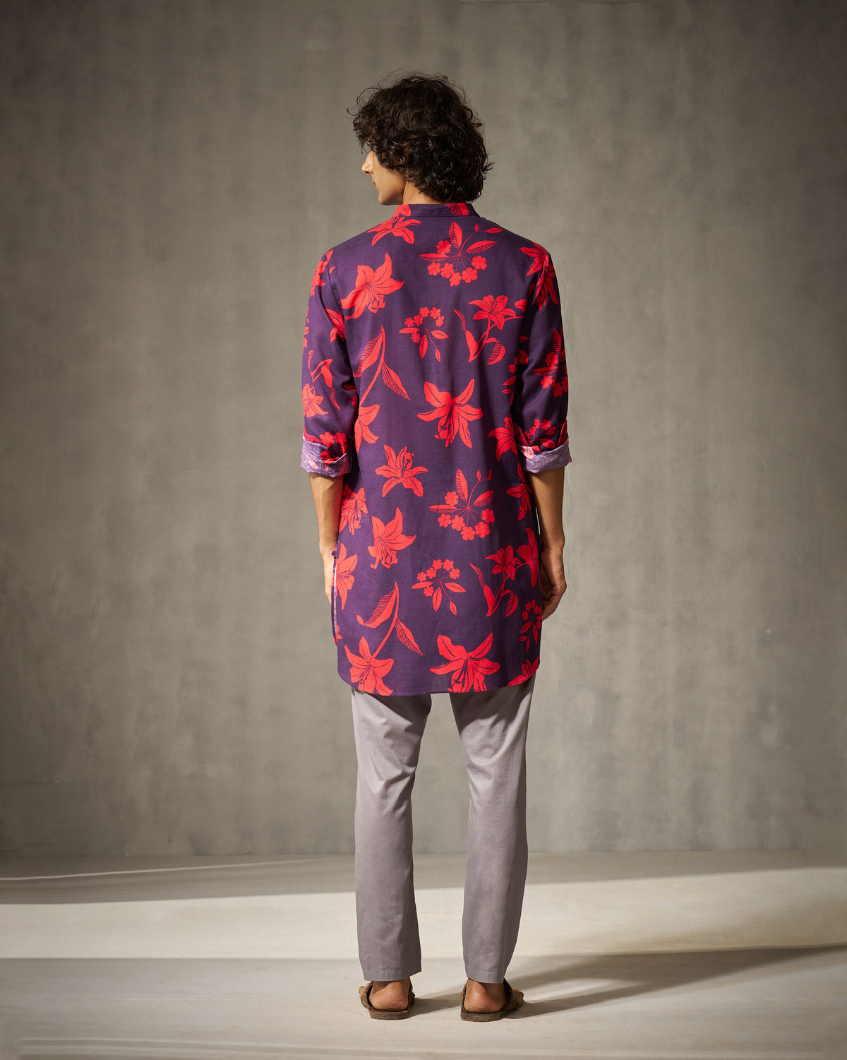 Back of a purple Fort Kurta with an all-over red floral print.