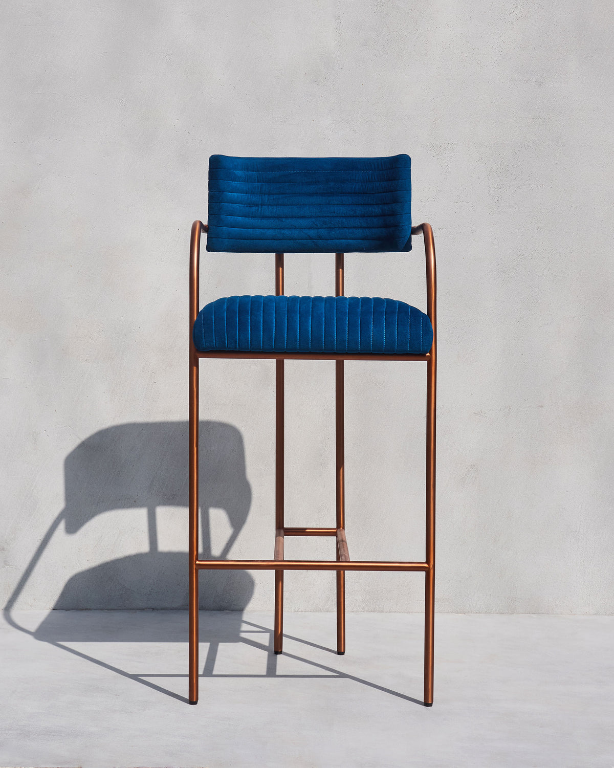Blue Contours of Time high chair with a copper metal frame.