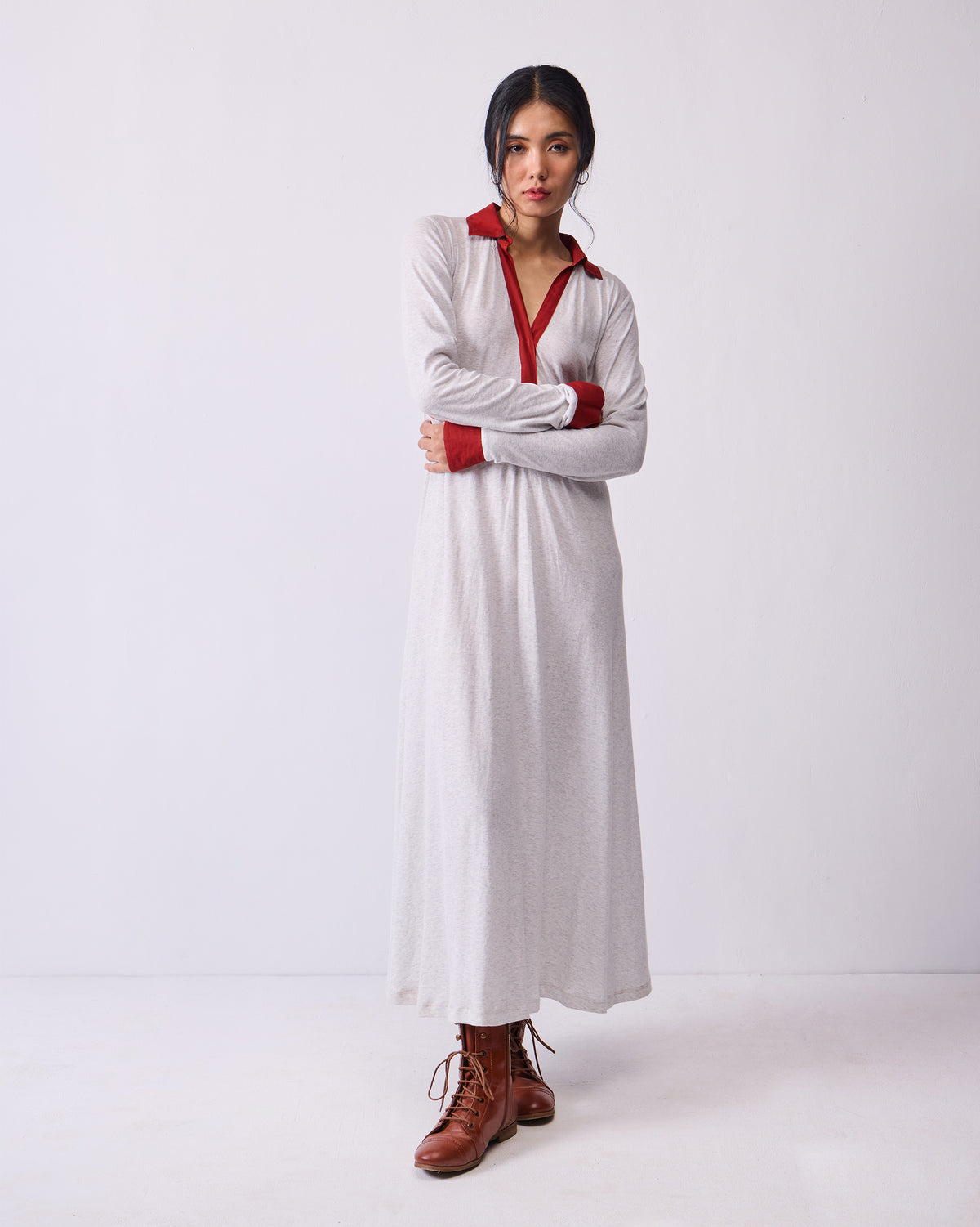 Grey Autumn Dress with rust collar and cuffs worn full length.