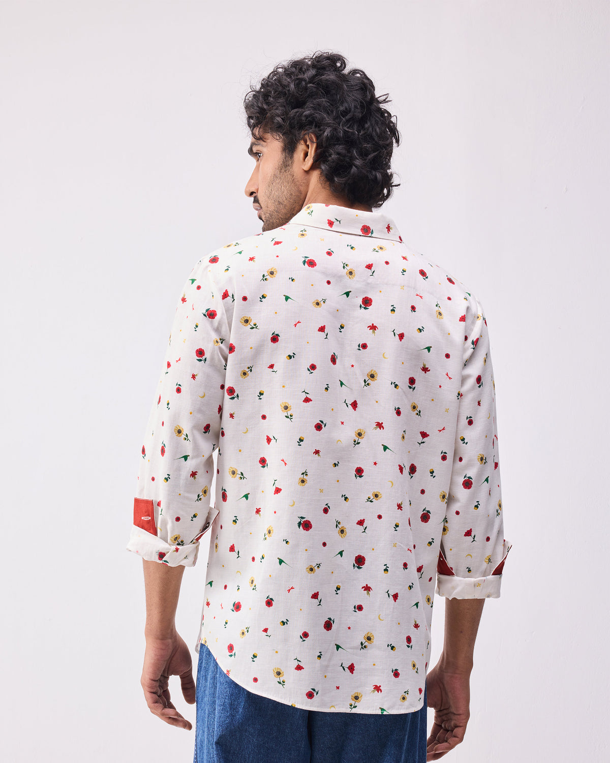 Back of an ivory Catamaran shirt with a small floral print.