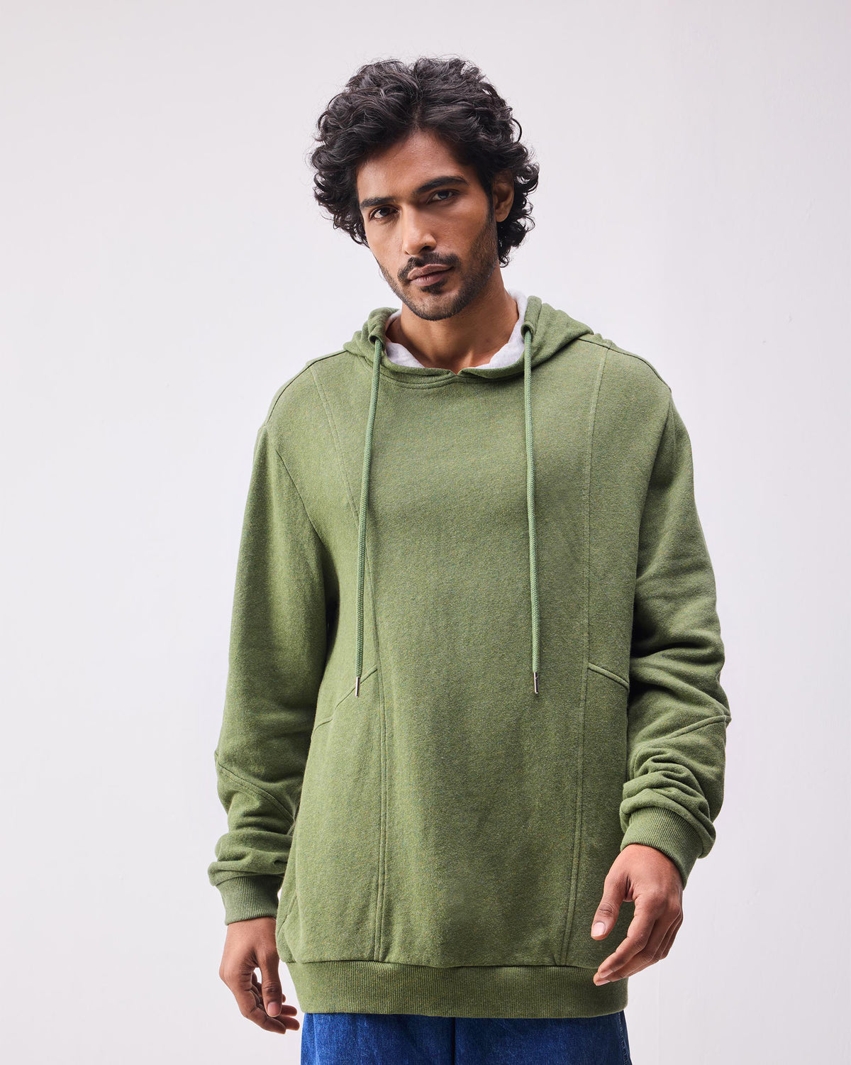 Olive green Urban Sweatshirt hoodie with paneled front seams.