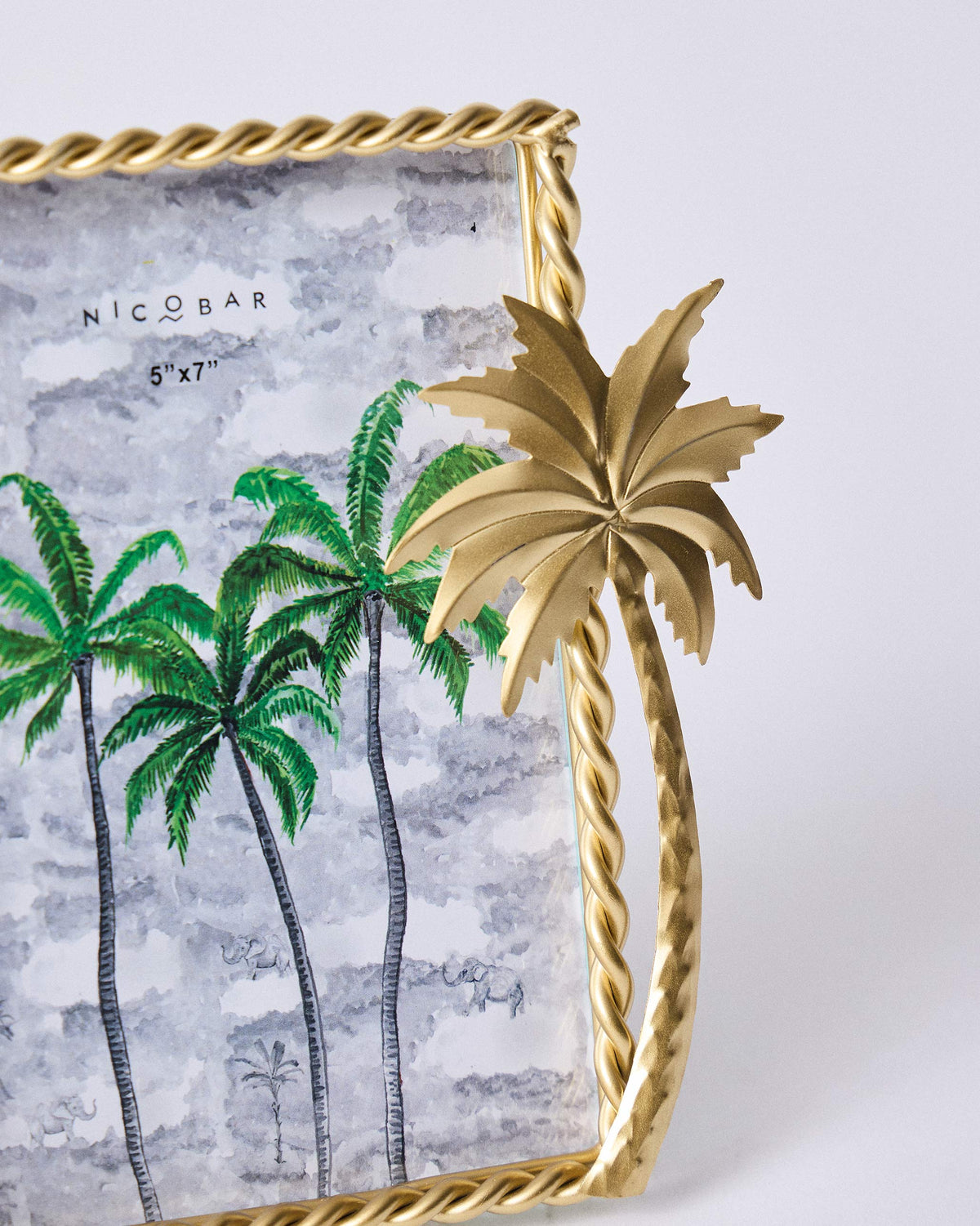 Close-up of a Gilded Palm frame showing the twisted gold border and palm fronds.
