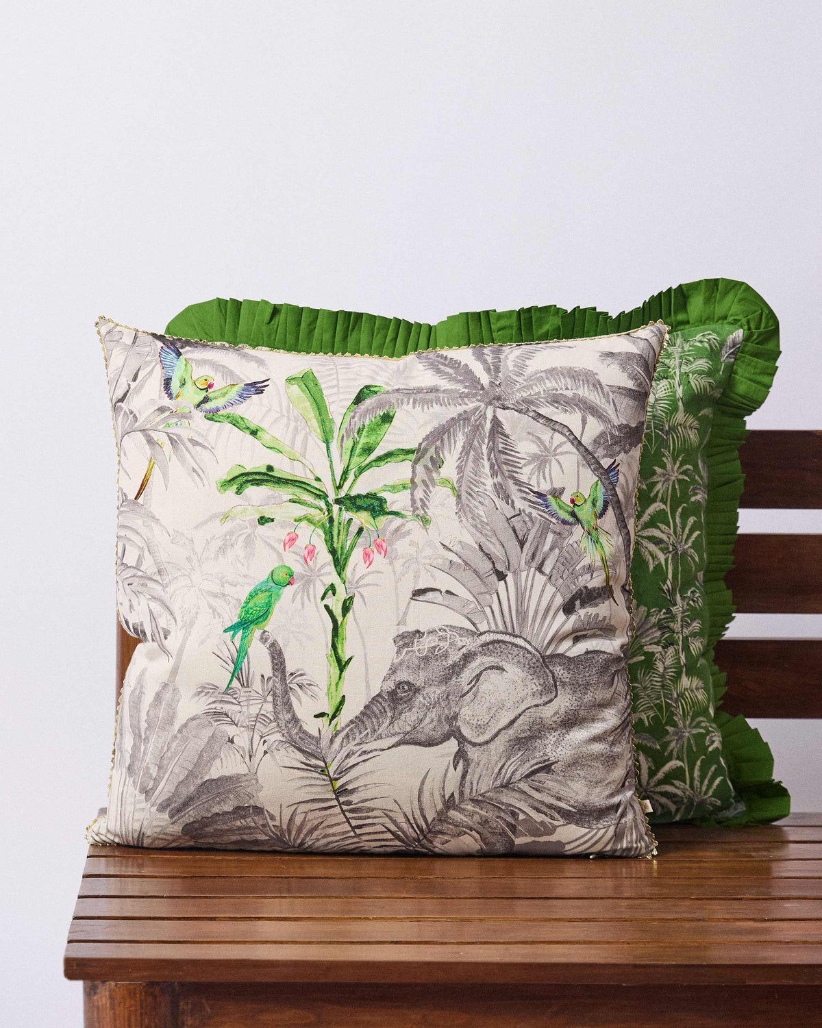 Ceylon Ele cushion cover with elephant, parrots, and gold gota trim.