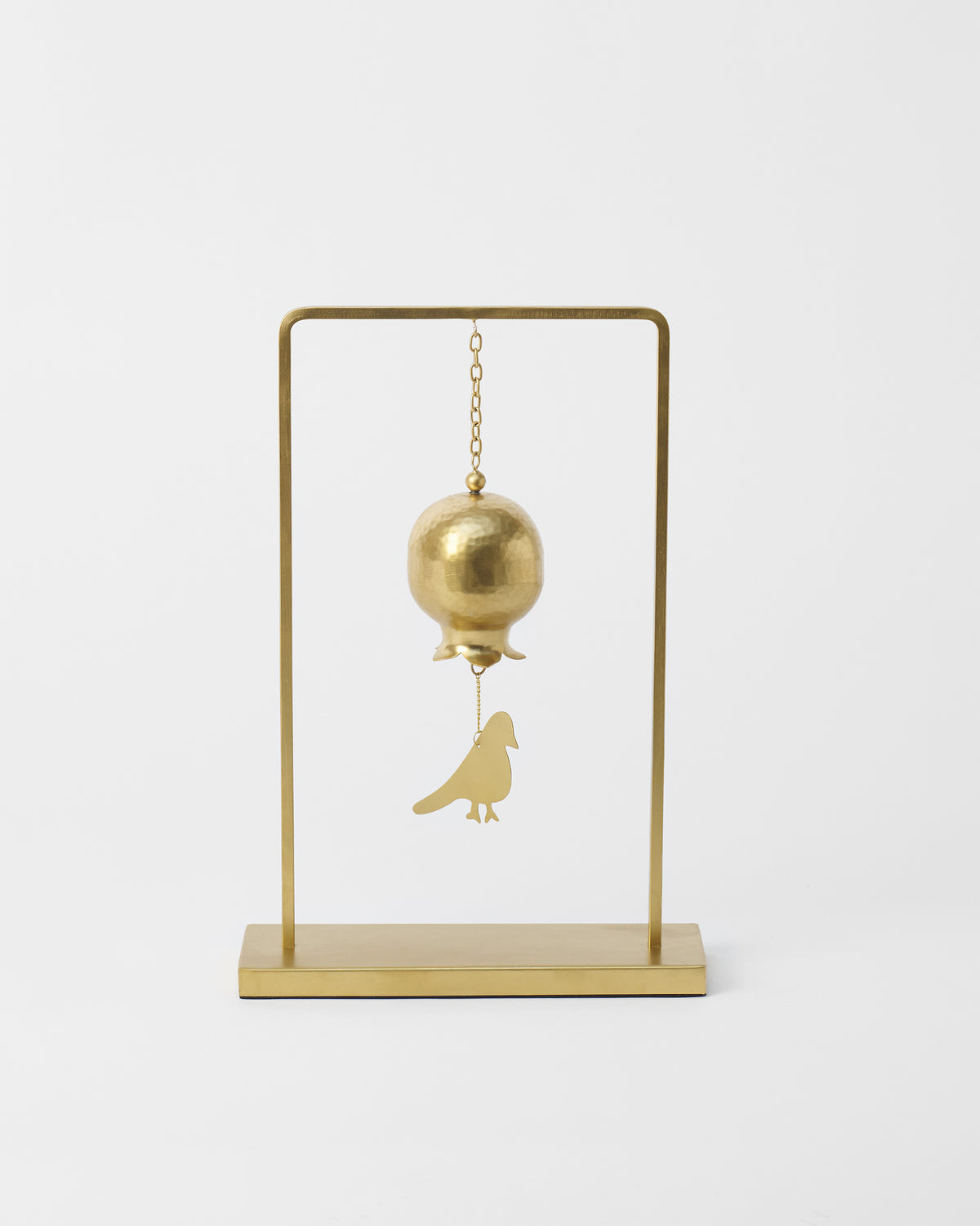 Spring Wind Chime with a brass bell and bird charm on a stand.