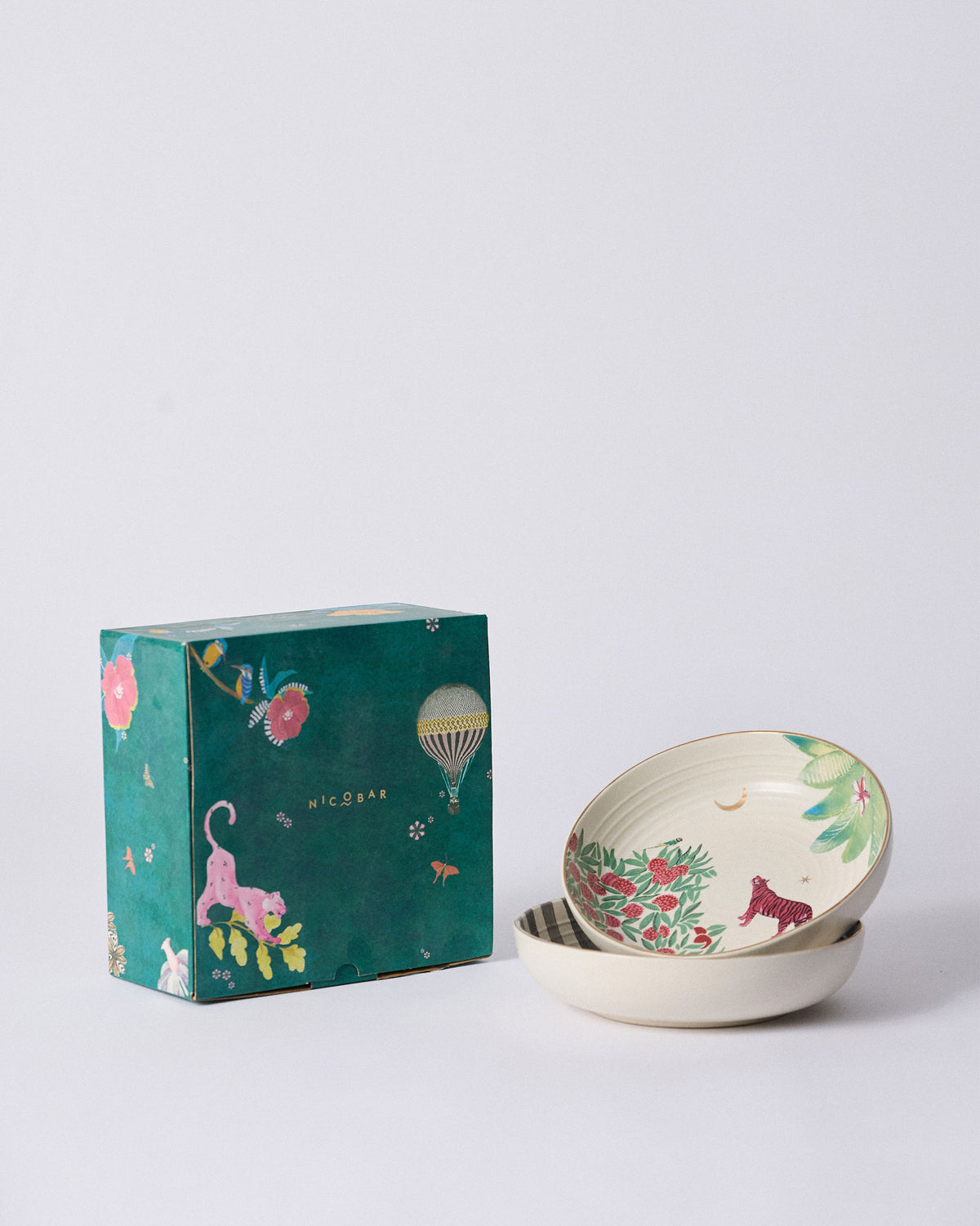 Ceylon Trail Shallow Bowl set of two with a teal Nicobar gift box.