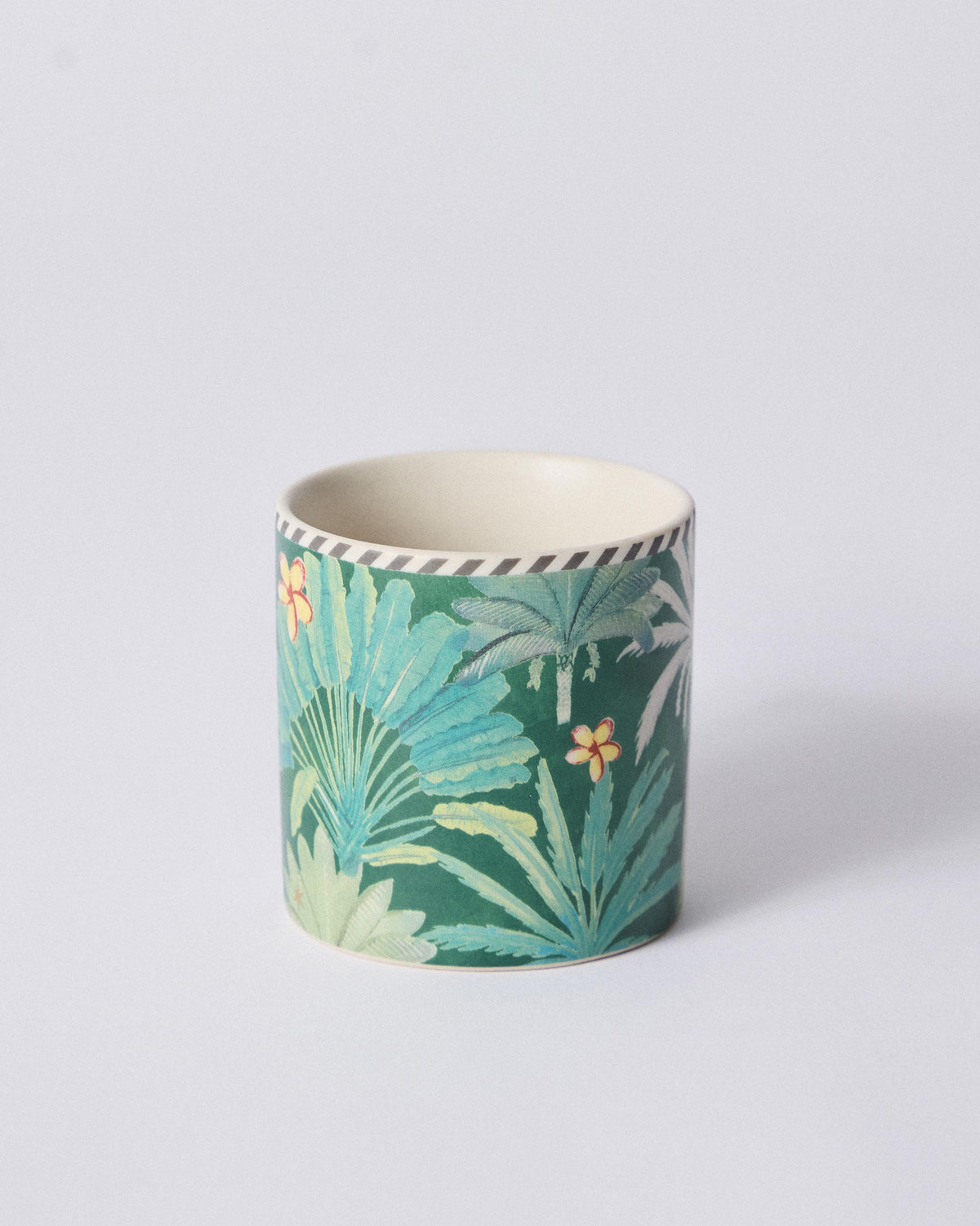 Ceylon Trail Straight Mug with green palm leaves and yellow flowers.