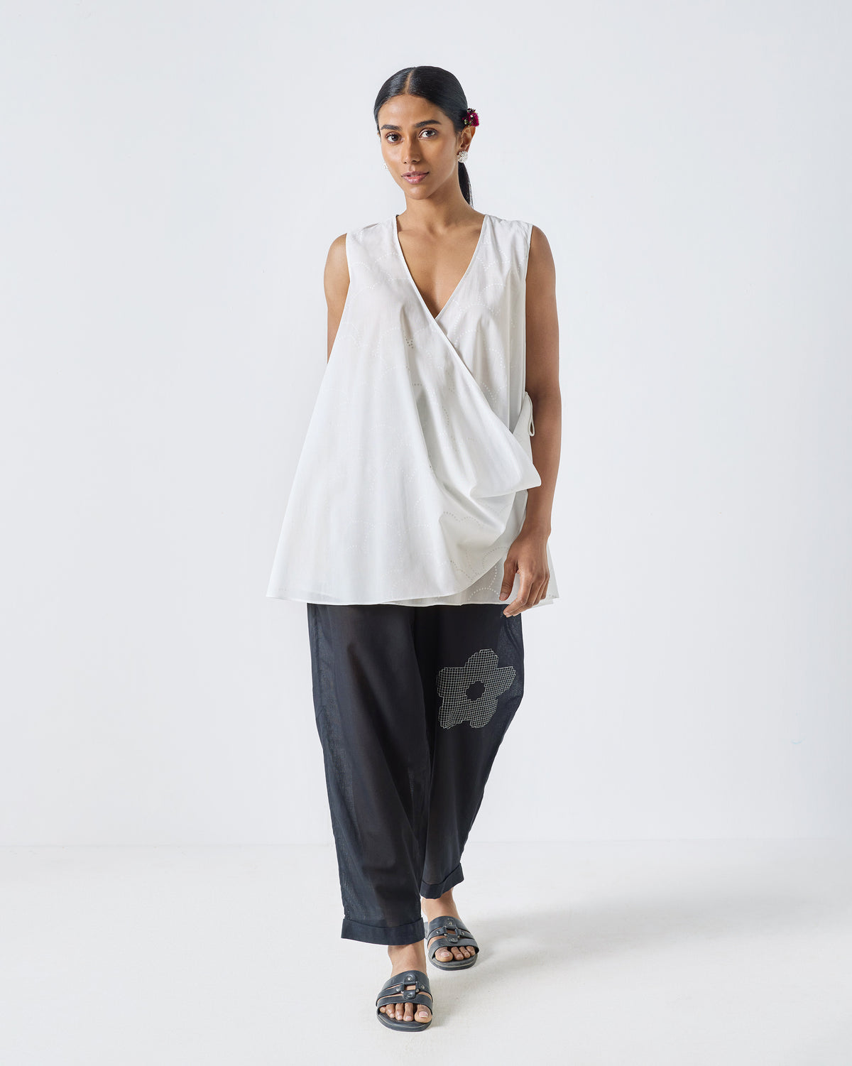 Full-length view of a white Ren top with a wrap front.