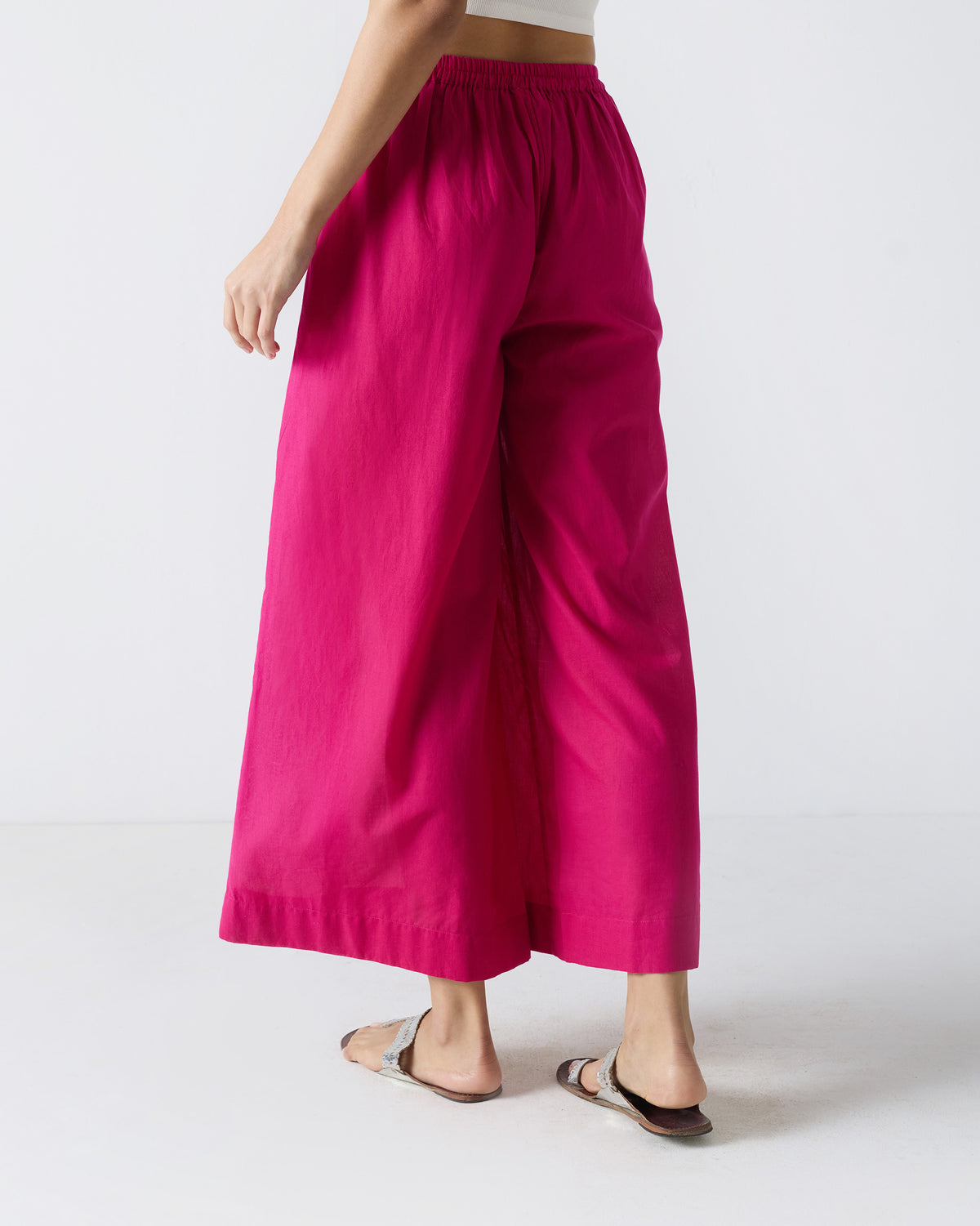 Back of fuchsia wide-leg Basic Pyjamas with a gathered elastic waist.