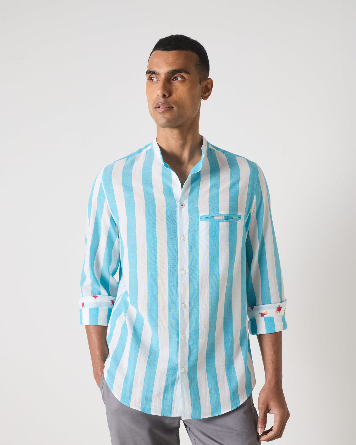 Blue and white striped Slim Fit Shirt with a mandarin collar and welt pocket.