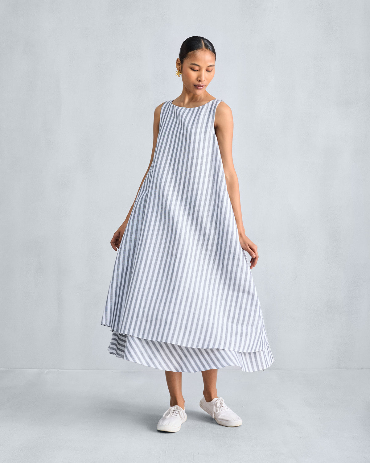 Full-length striped double-layer dress with a flared A-line silhouette.